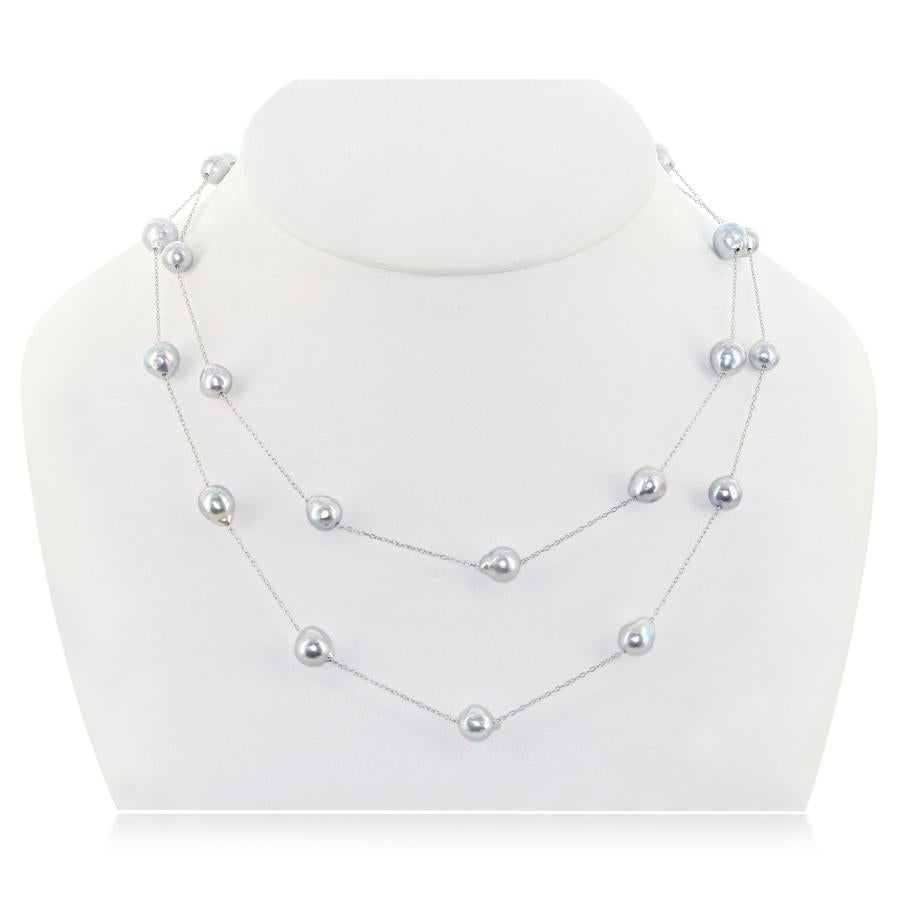 This cultured Japanese Akoya baroque pearl and sterling silver tin-cup necklace features pearls that are a natural blue color. the pearls range in size from 6.5-9mm. The necklace can be worn as a long, single rope or doubled up. The necklace