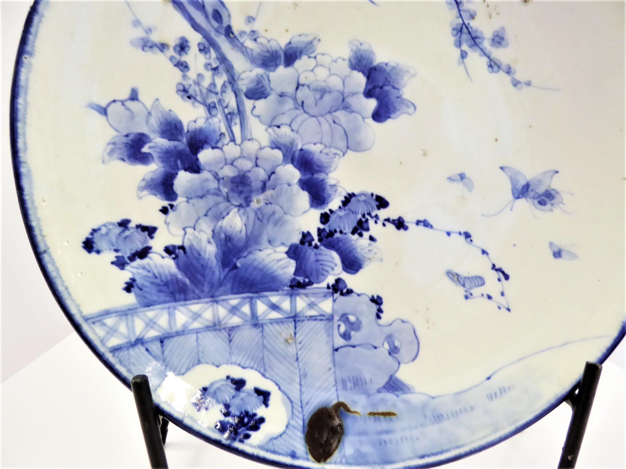 Glazed Japanese Blue and White Arita Charger with Butterflies, Peonies and Sakura