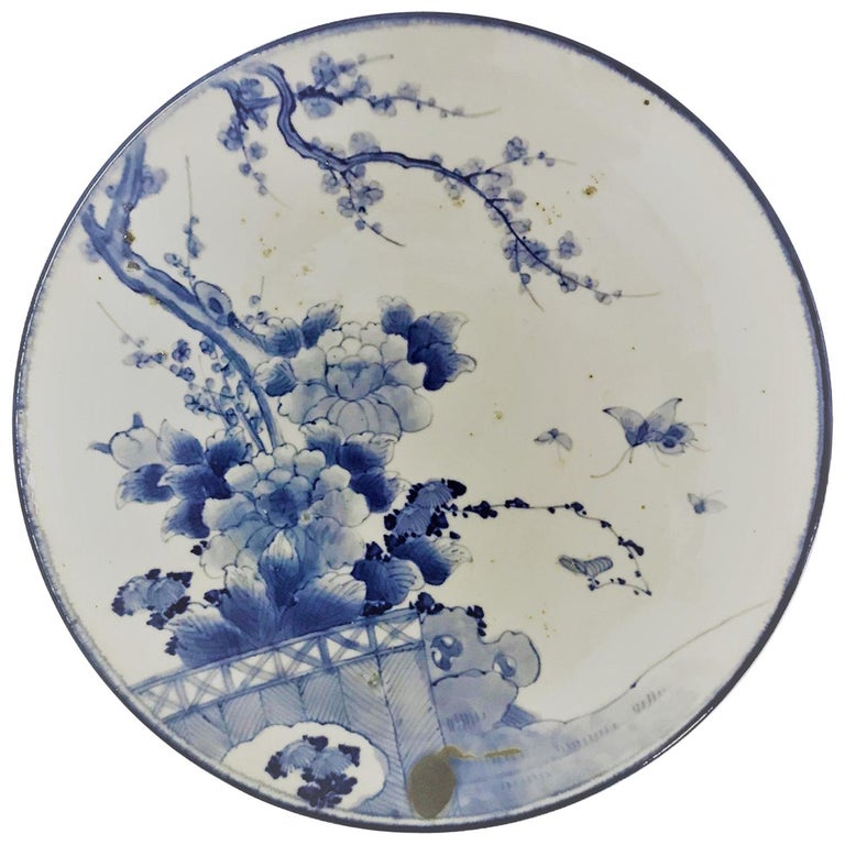 Japanese Blue and White Arita Charger with Butterflies, Peonies and Sakura For Sale