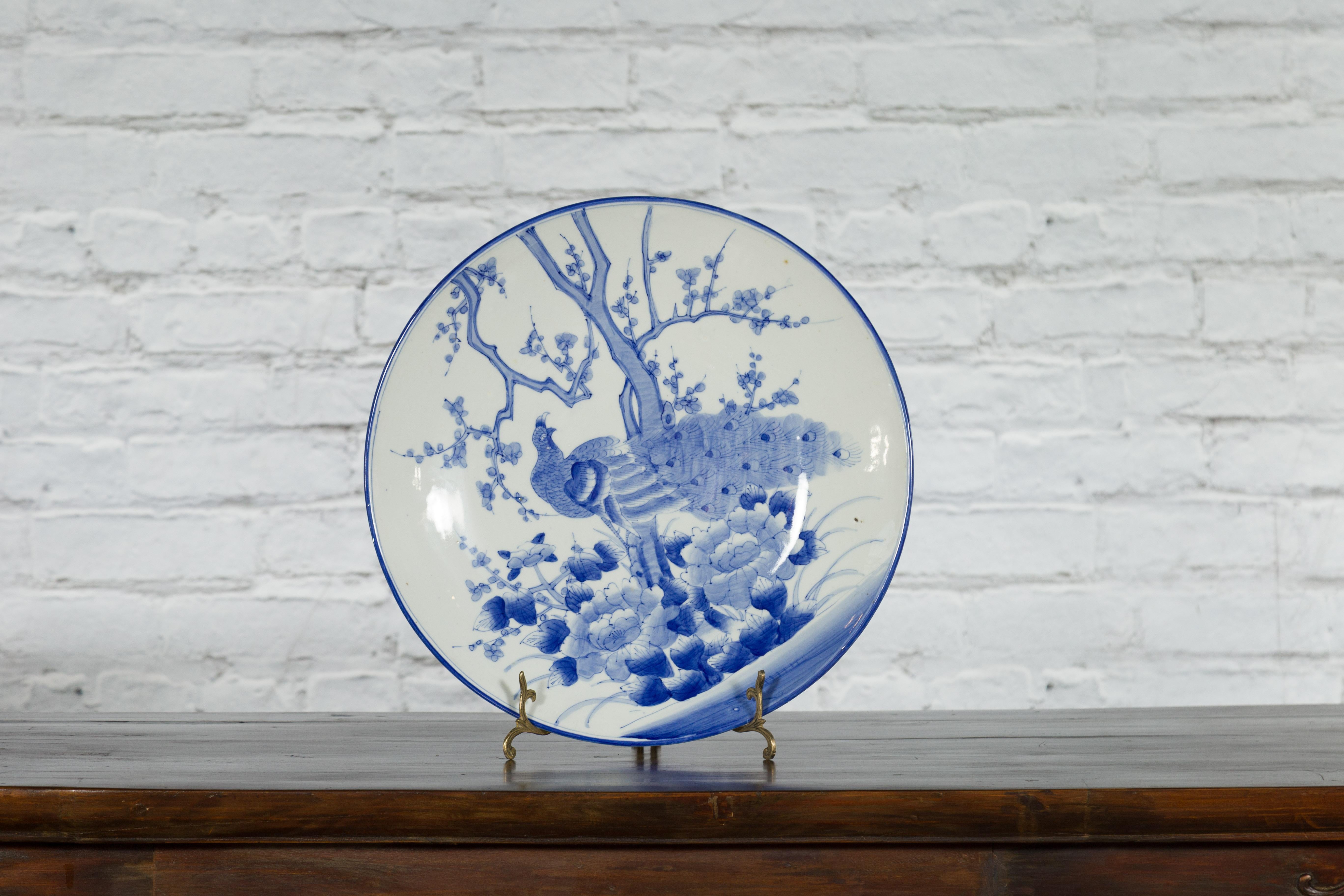 19th Century Japanese Blue and White Hand-Painted Porcelain Charger Plate with Peacock Bird For Sale