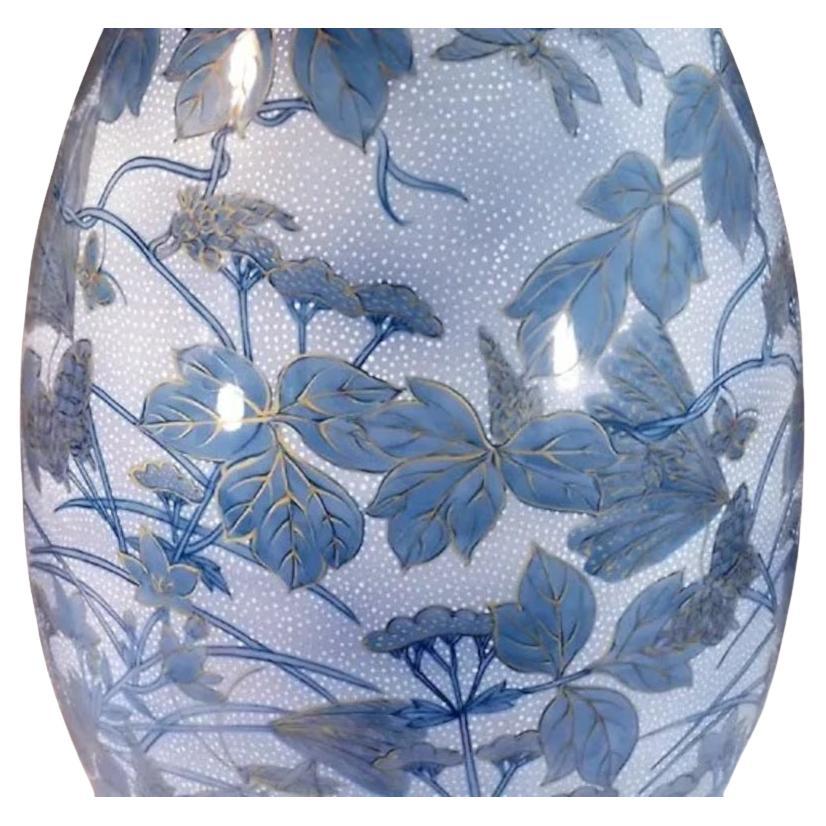 Exceptional Japanese contemporary porcelain vase, hand painted in blue underglaze on a stunningly shaped porcelain body, a signed masterpiece by highly acclaimed master porcelain artist of the historic Imari-Arita region of southern Japan, known for