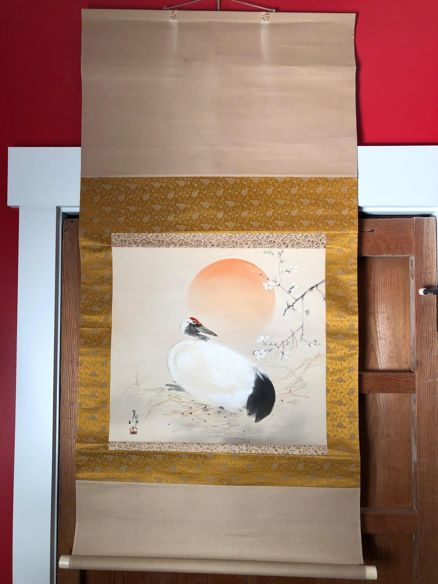 A beautiful and compelling Japanese antique hand-printed scroll of a brilliant sun with a serene crane scroll worthy of your favorite room.
Hand painting on silk in simple classic Japanese striking soft pleasing colors,