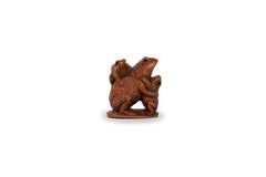 Japanese boxwood netsuke in the form of three toads stacked on each other