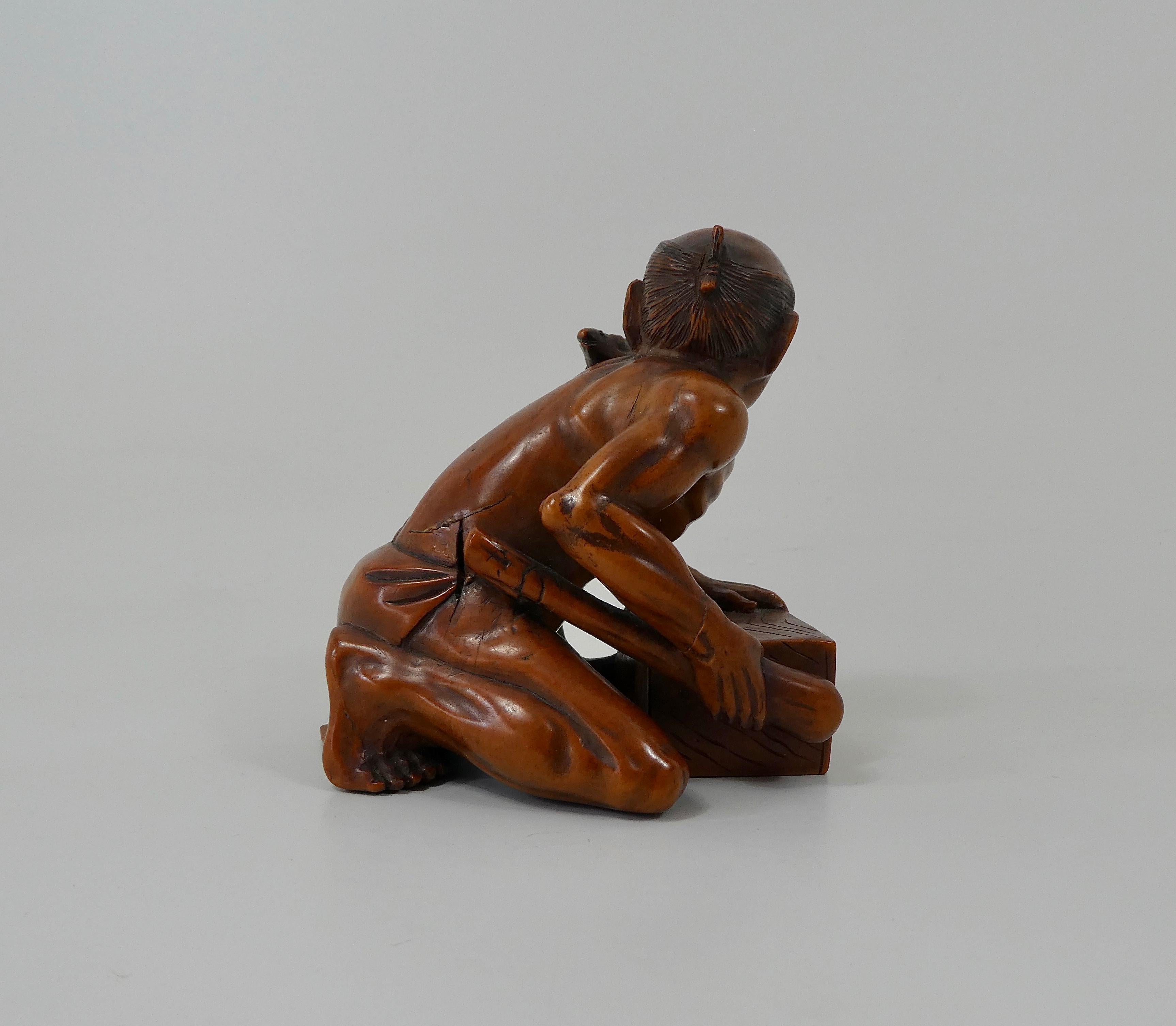 Carved Japanese Boxwood Okimono of a ‘Rat Catcher’, Meiji Period