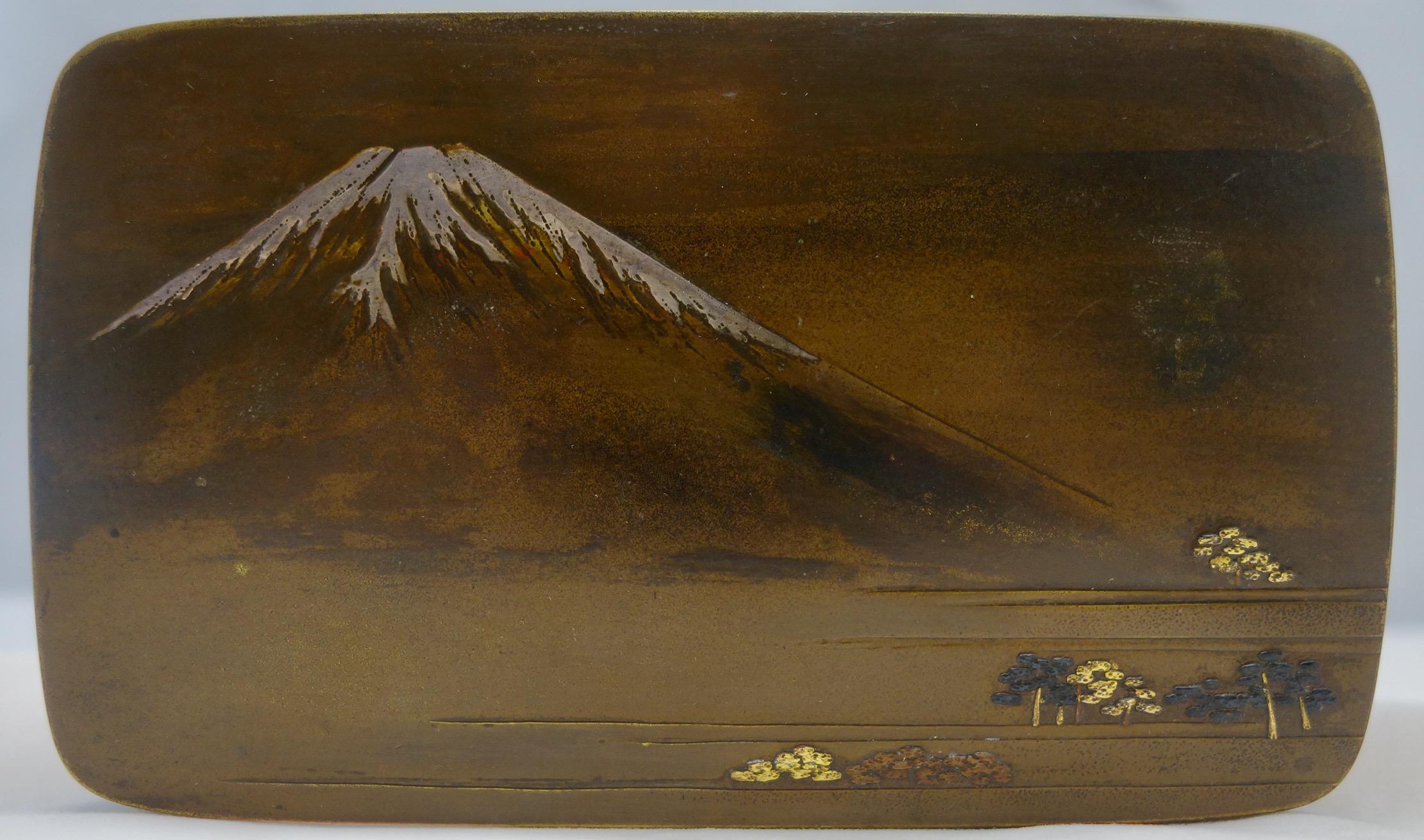 Japanese mixed metal box with the view of Mount Fuji executed in silver, and covered with birds and plants overlay all around. The box is from Meiji period circa 1890s, and it is 5 3/4