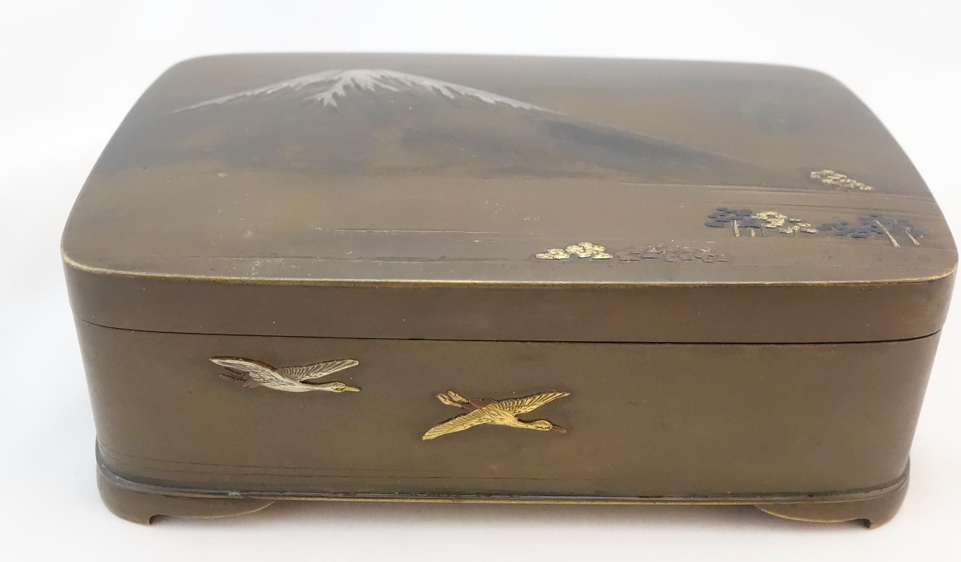 Appliqué Japanese Bronze and Mixed Metal Shakudo Covered Box Mount Fuji View Meiji Period
