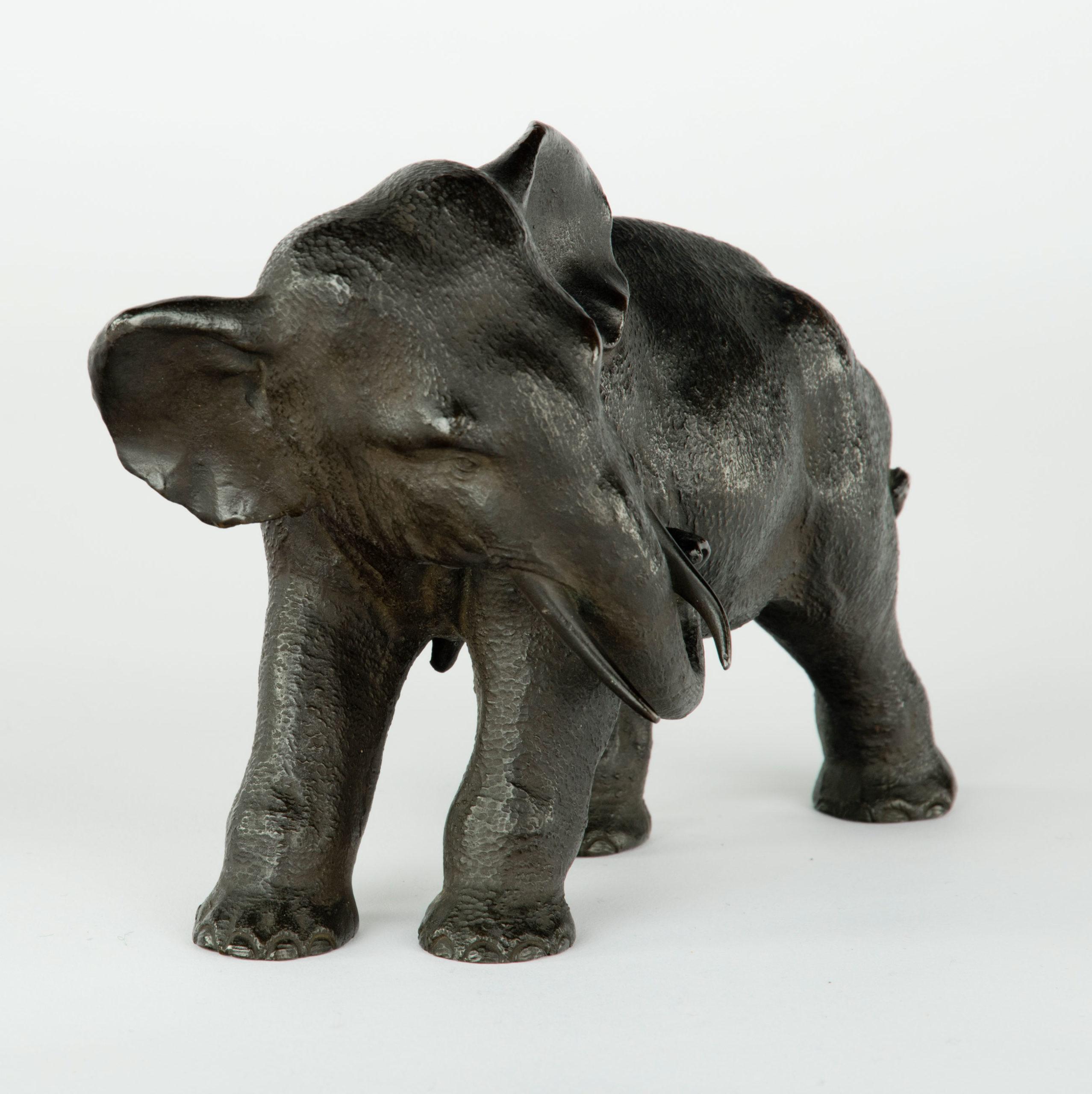 As part of our Japanese works of art collection we are delighted to offer this diminutive Meiji Period 1868-1912, bronze okimono depicting a strolling elephant, this small but fine quality casting has been manufactured by the highly regarded artist