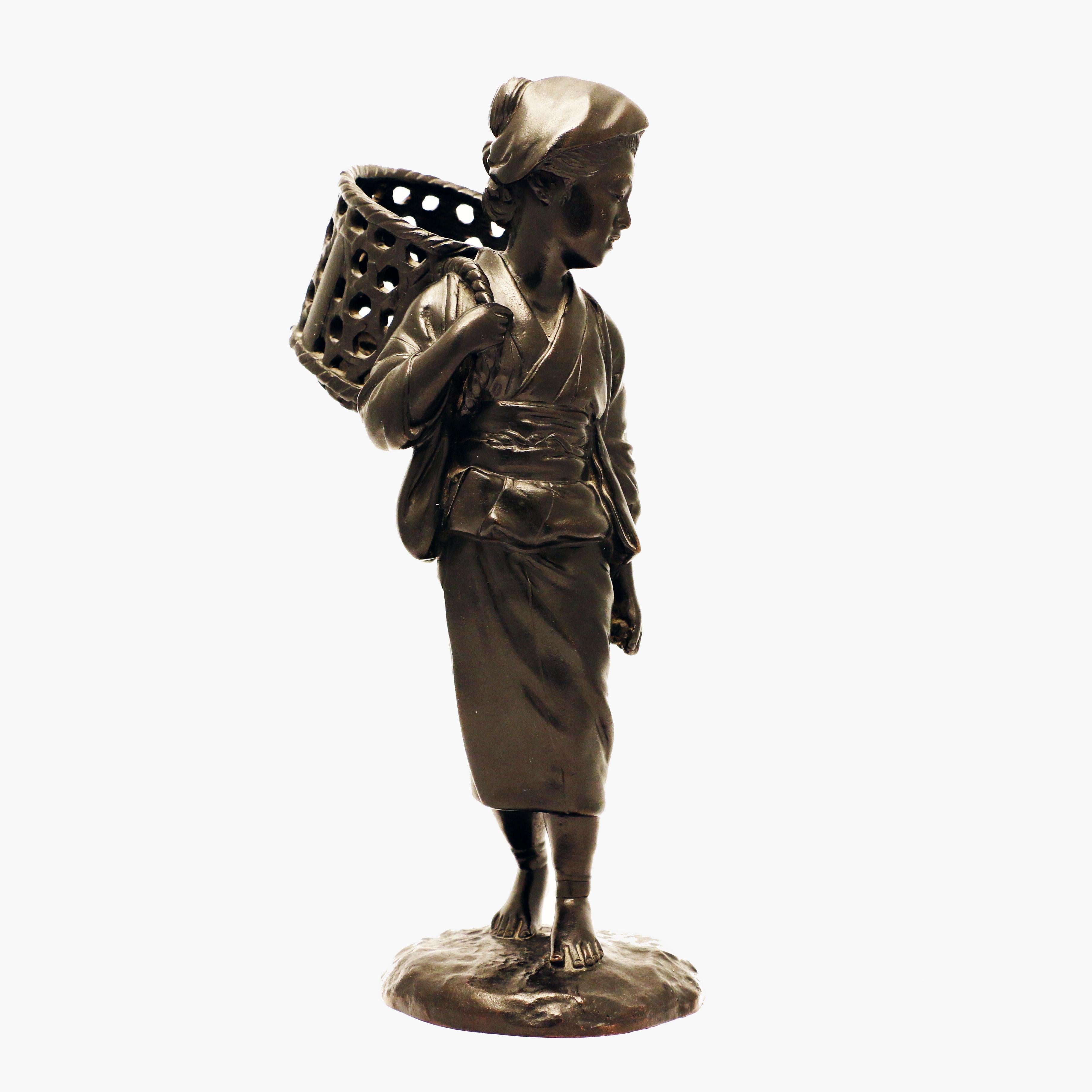 Cast Japanese Bronze Figure, a Peasant Girl with a Wicker Basket