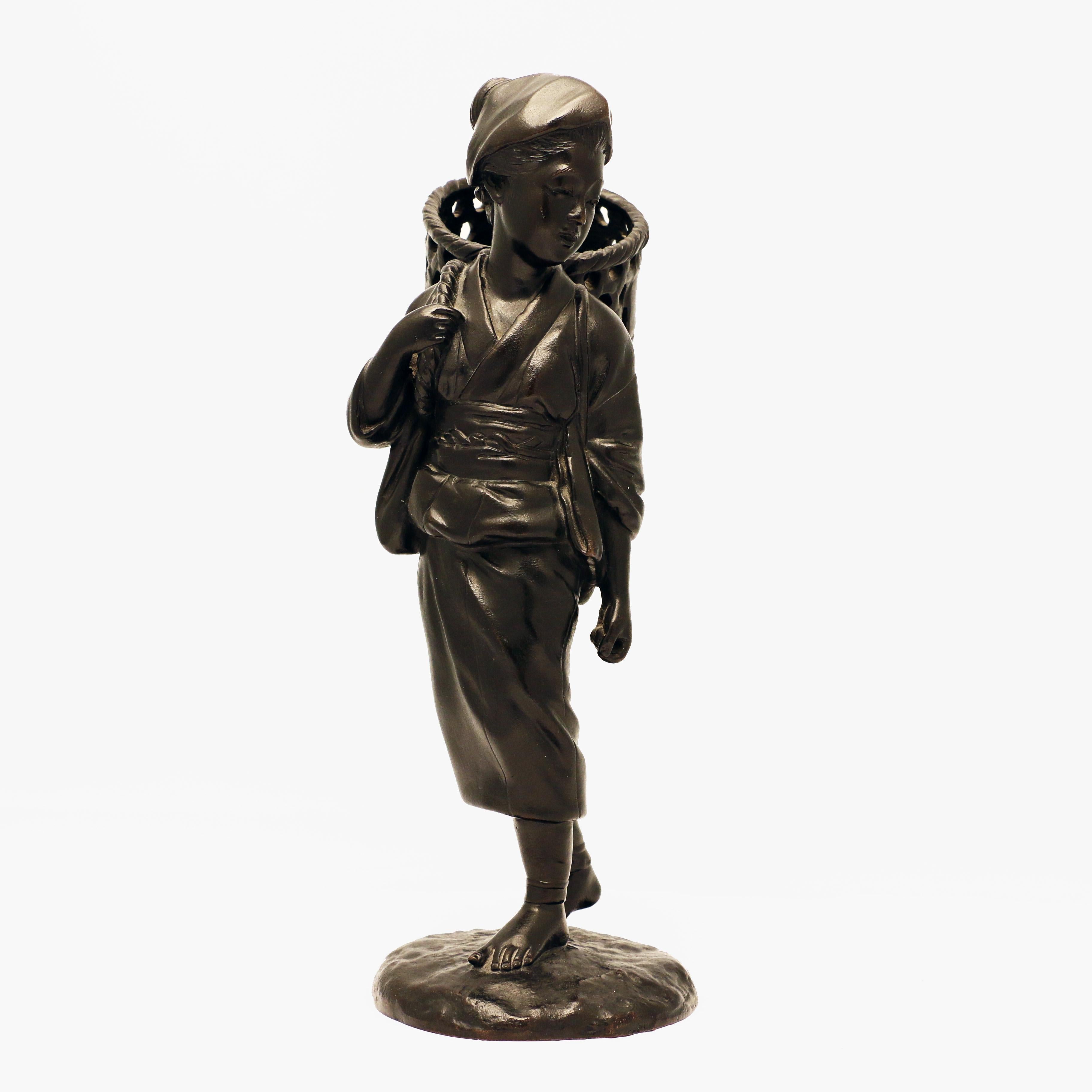 Japanese Bronze Figure, a Peasant Girl with a Wicker Basket In Good Condition In Montreal, QC