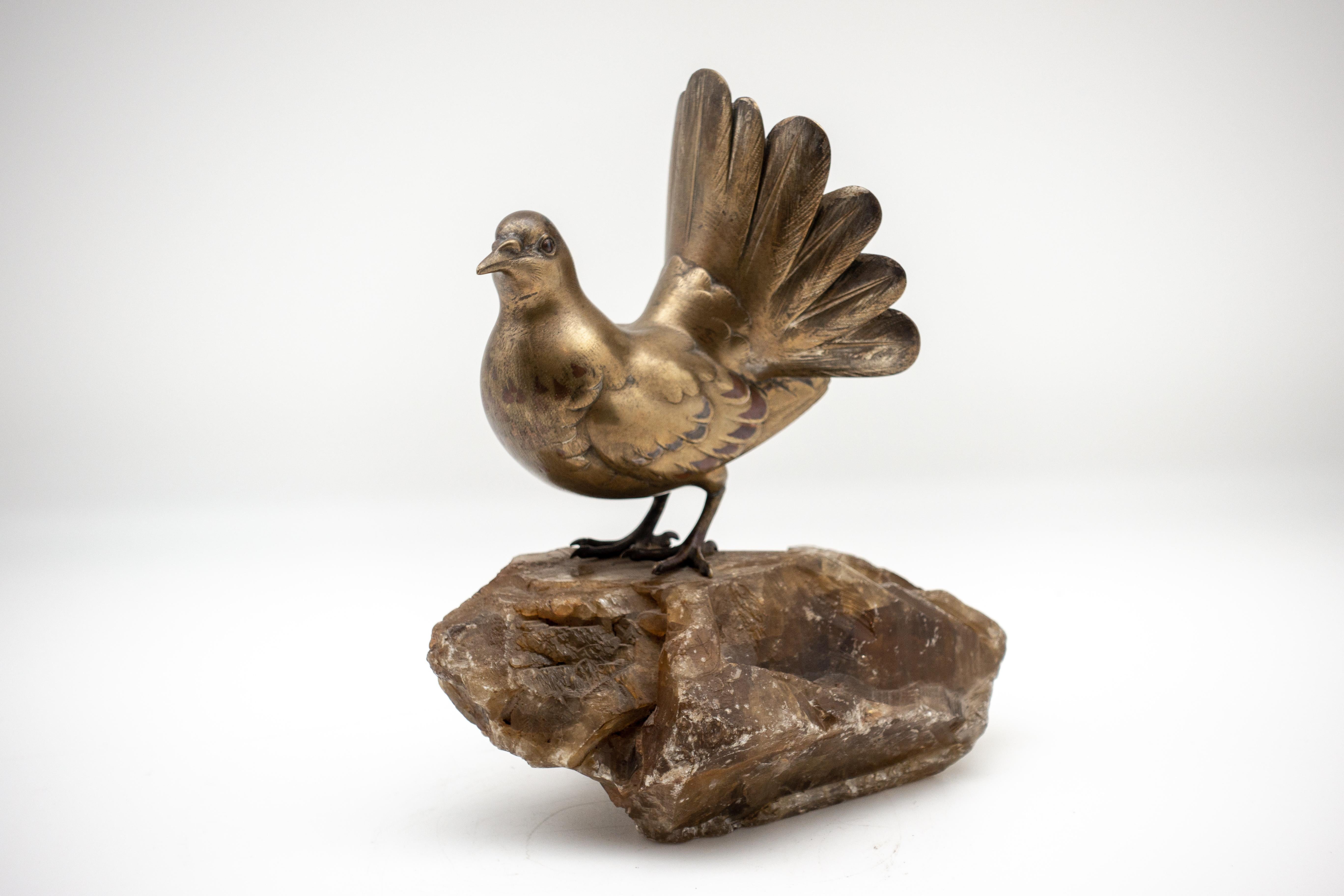 Beautiful Japanese bronze fowl mounted on a smoky rock crystal base. Signed.