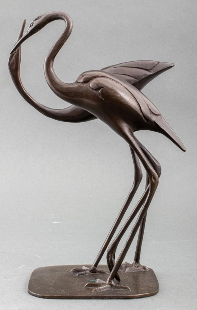 Japanese patinated bronze sculpture depicting two standing egrets or herons, apparently unsigned.

Dimensions: 13.5