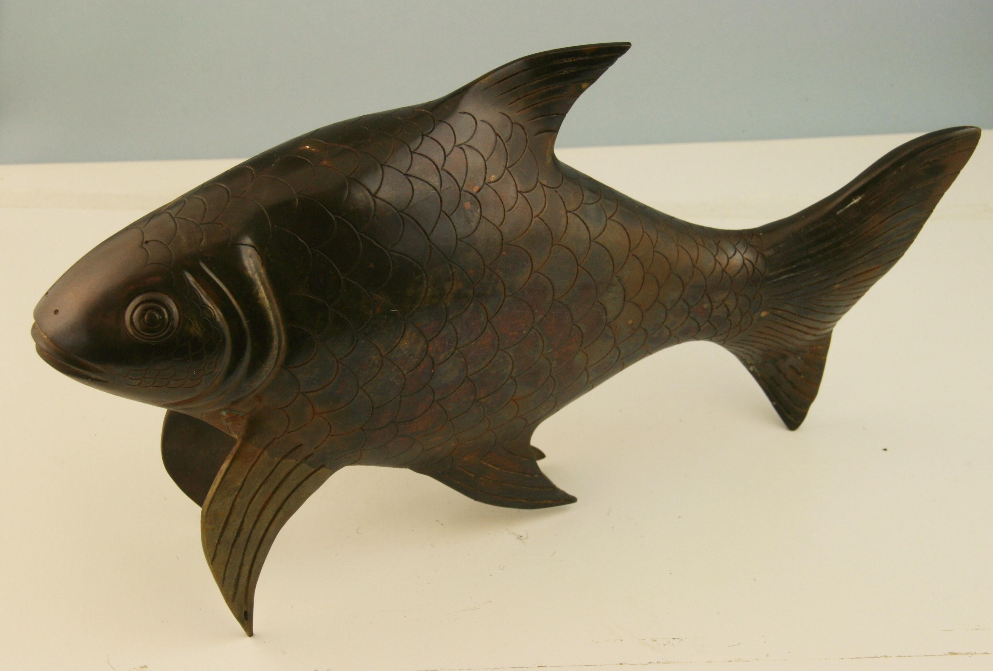 Japanese large scale hand cast bronze Koi fish with fine detail.
The Koi is symbolic of prosperity, perseverance and good fortune