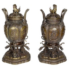 Japanese bronze lidded urns, Meiji period.