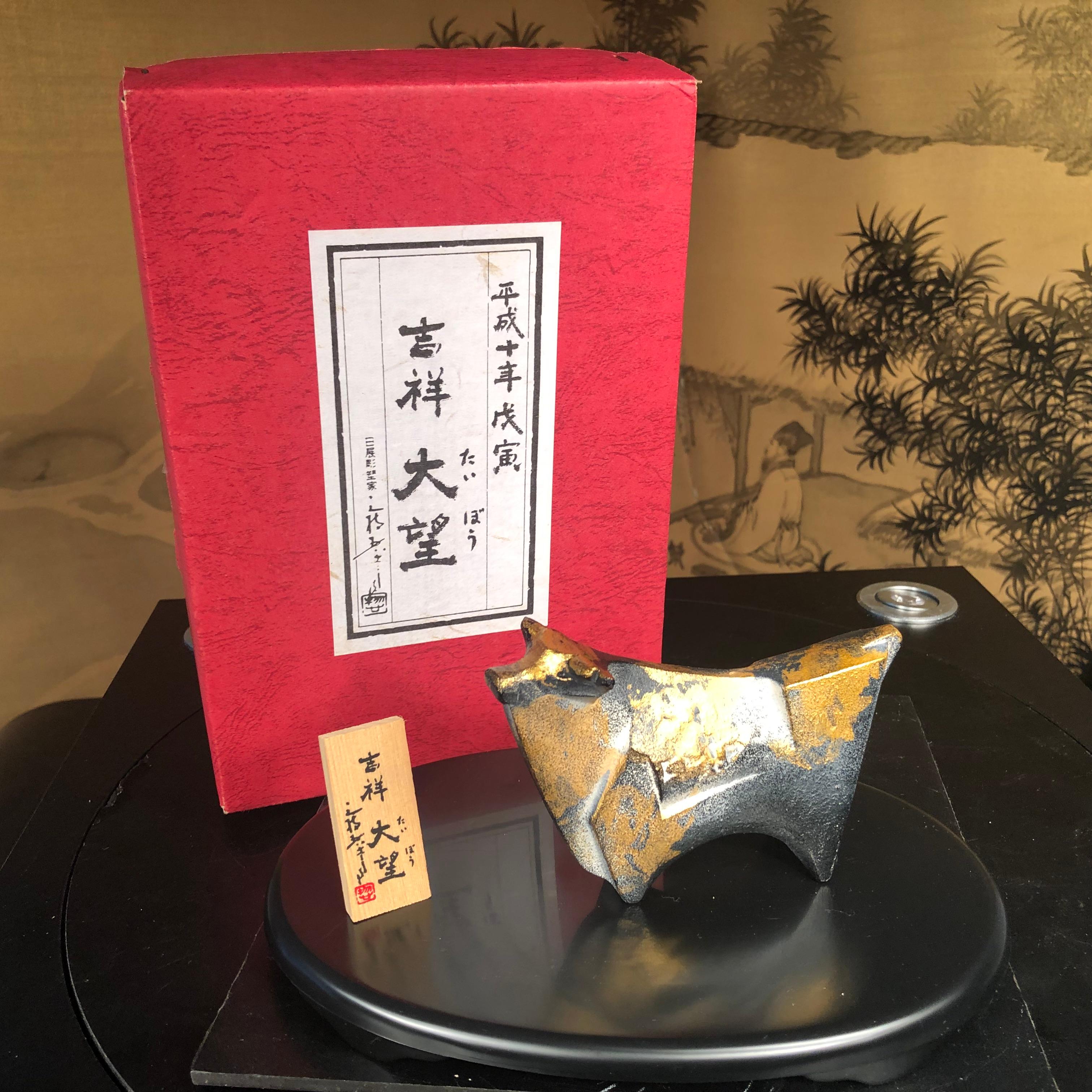 The first we have seen mint and boxed.

This enigmatic large scale cow or bison, bathed in gold gilt was designed by the Japanese legend mid 20th century designer Sotaro Saegusa and in a large form, it possesses a wonderful original black, white and