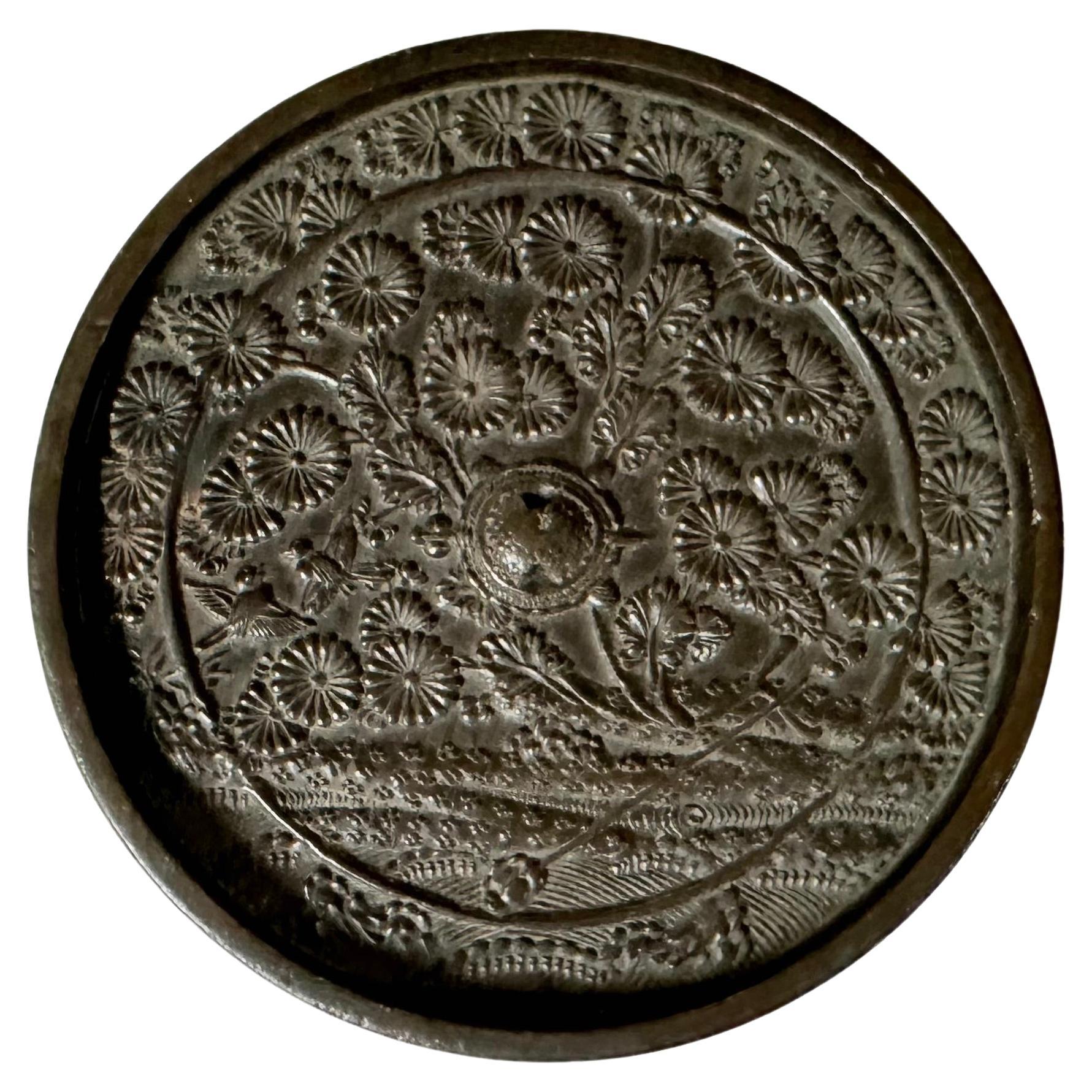 Espejo japonés de bronce