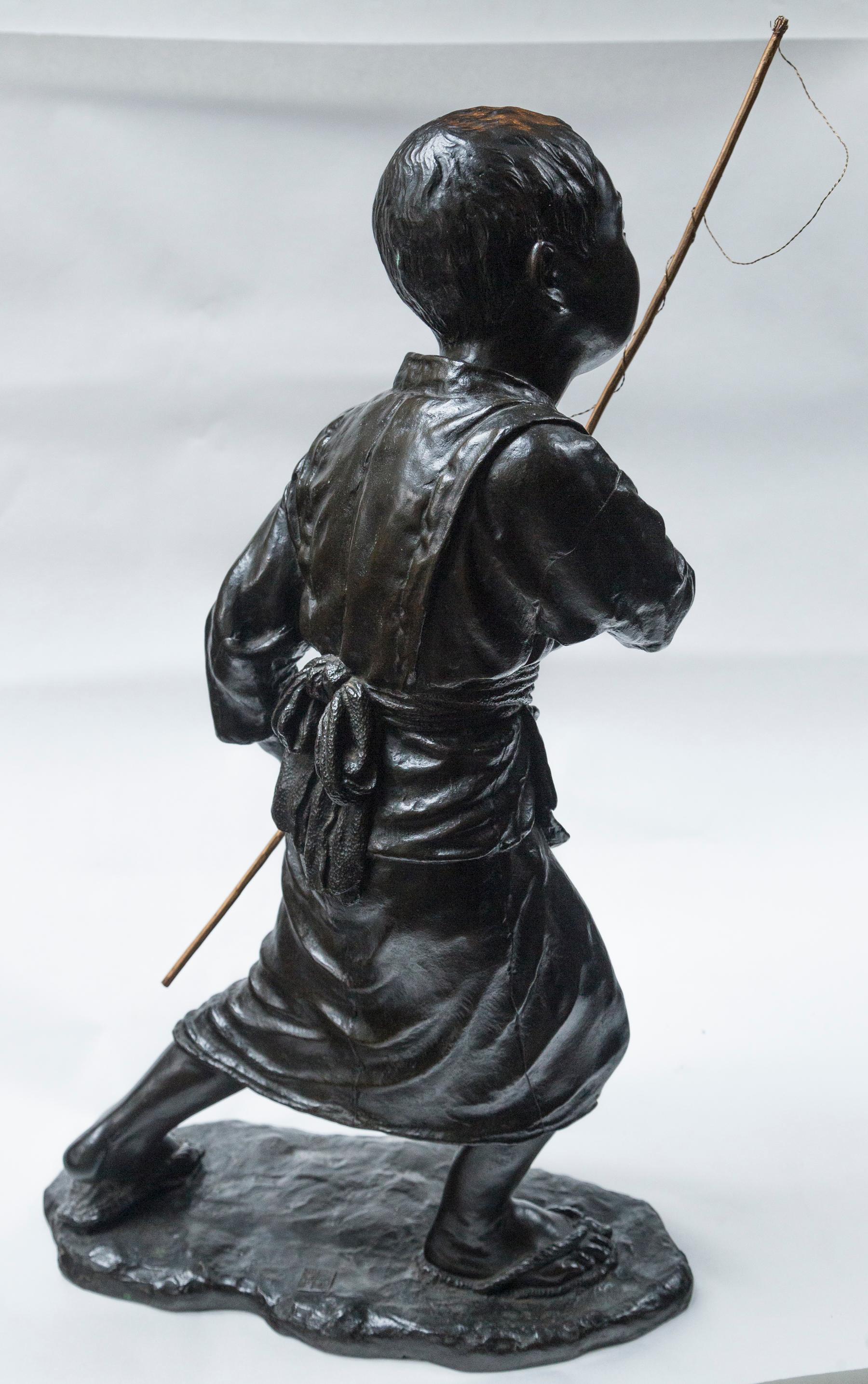 Japanese Bronze of a Young Boy with Fishing Pole In Good Condition For Sale In Woodbury, CT