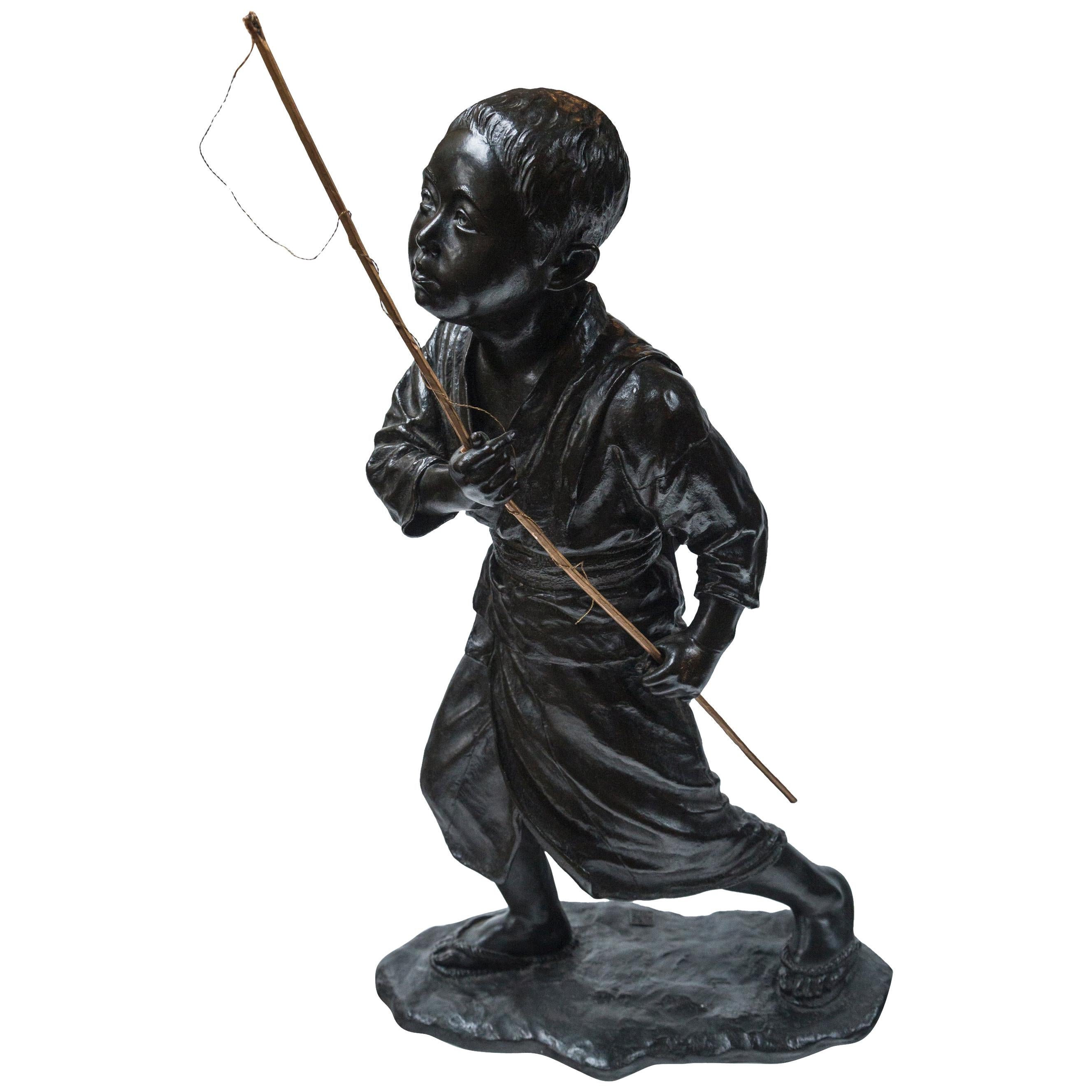 Japanese Bronze of a Young Boy with Fishing Pole For Sale