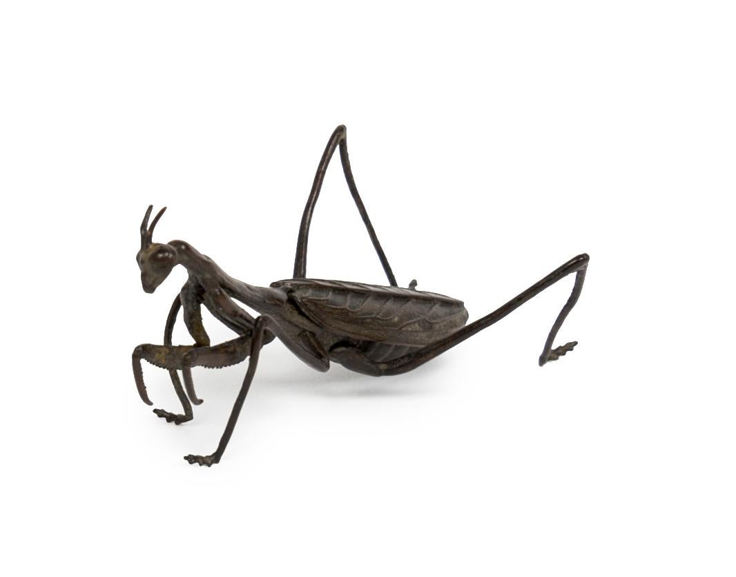 Jizai okimono sculpture of an articulated bronze praying mantis.
Insects (mushi) play an important role in Japanese culture. Insect hunting is a popular pastime, especially among children. Using nets and cages, they catch cicadas, beetles and other