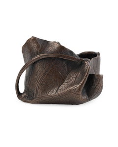 Japanese bronze sculpture in the form of a lotus leaf and snail shell