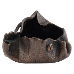 Japanese bronze sculpture in the form of a lotus leaf and snail shell