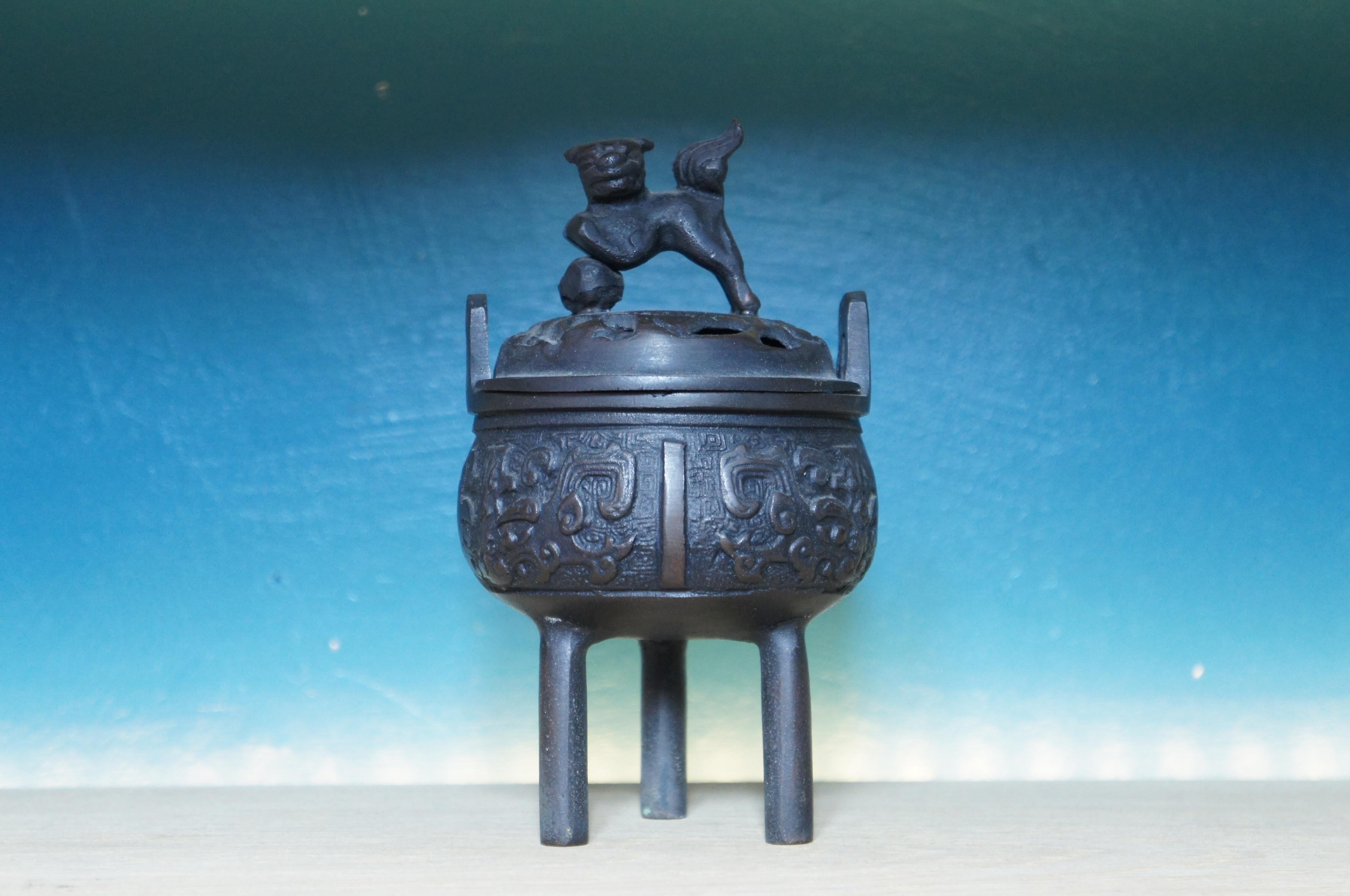 Japanese bronze censer with lion foo dog (Shishi).

In japan, censer is one of the three Buddhist altar fittings, a flower vase, a candle stand and a censer.
  