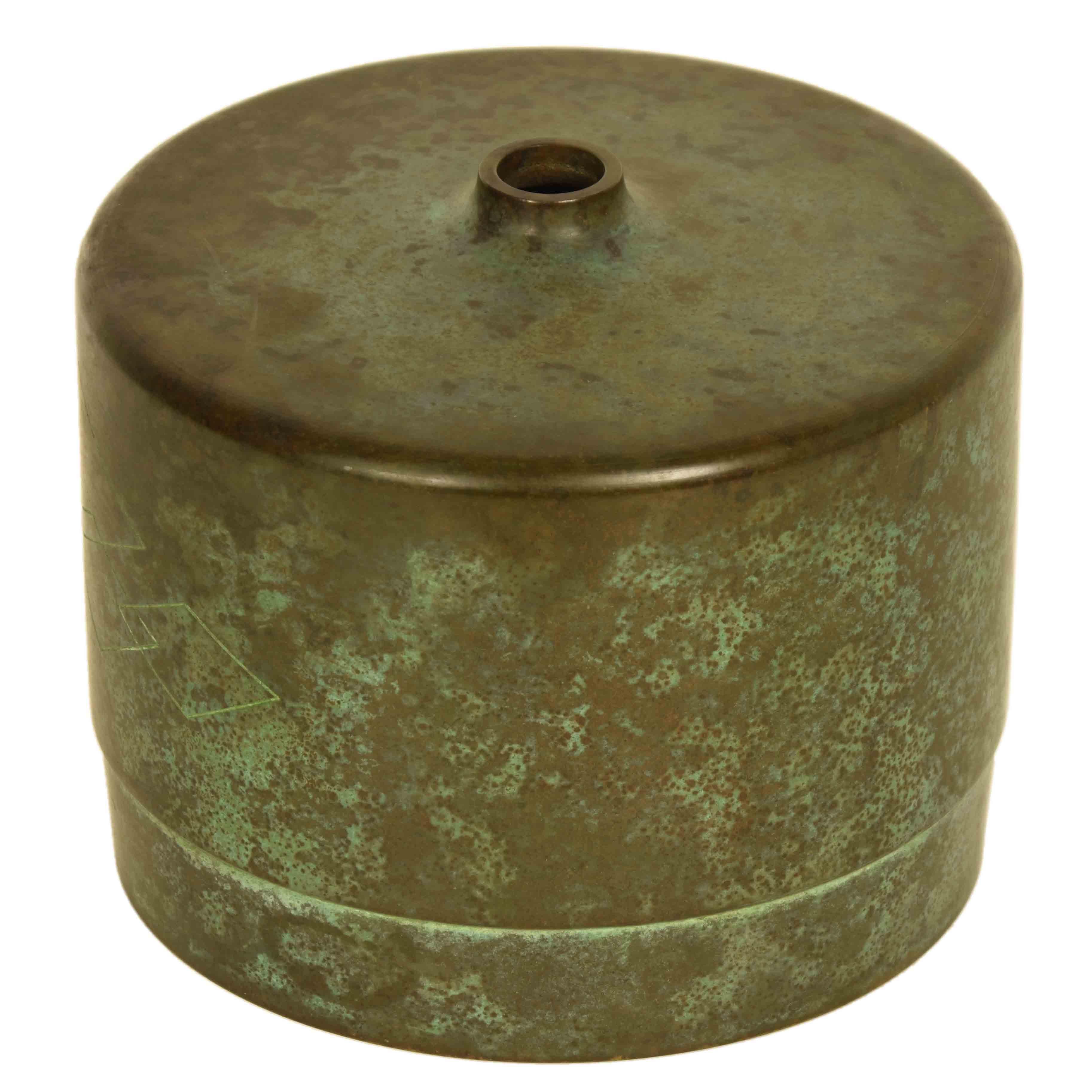 A vintage, mid-century Japanese bronze vase from Takaoka. Takaoka is a city on the main island of Honshu. While bronze work originated in China, Japanese artisans have developed an array of techniques in the production of decorative bronzes that