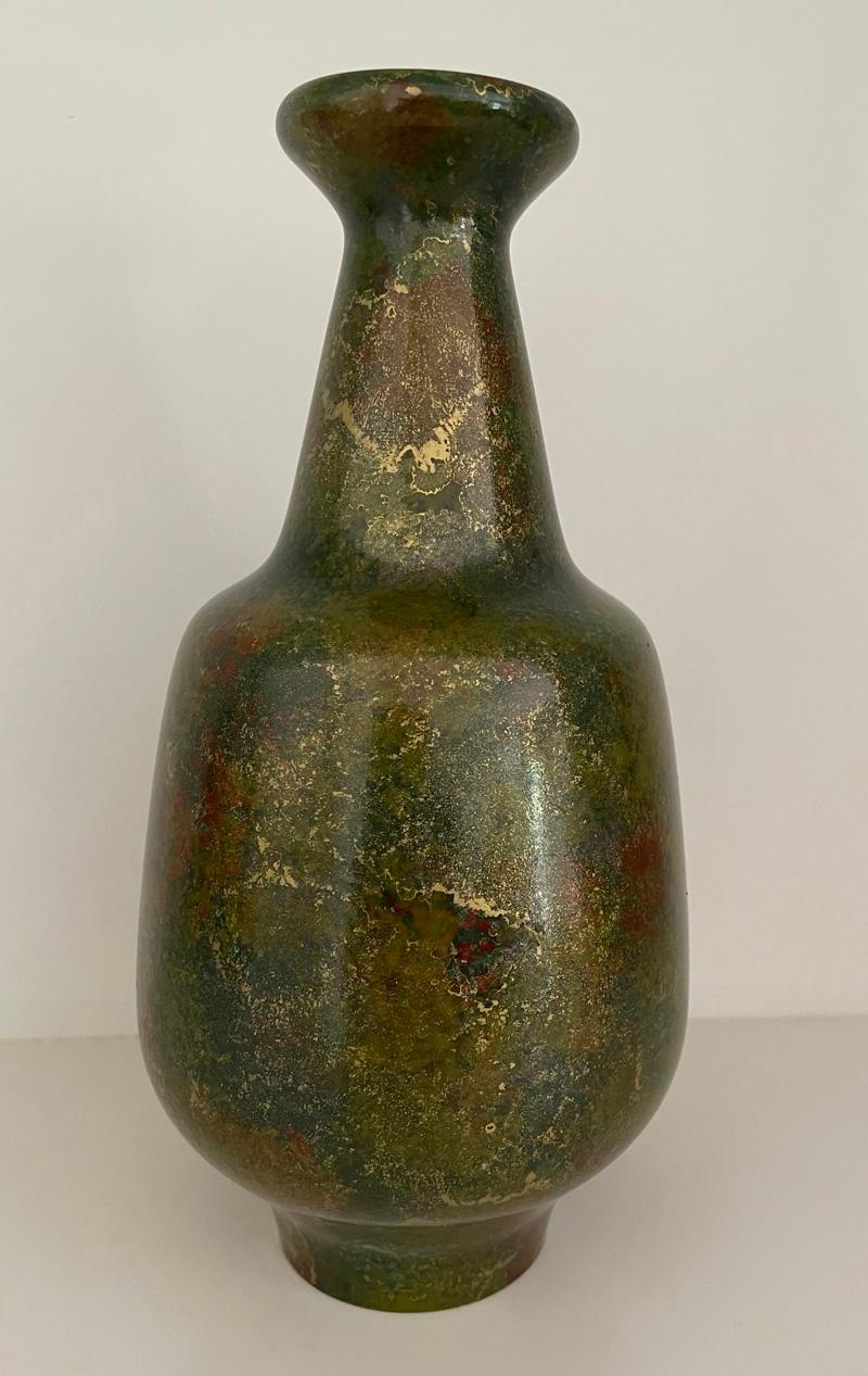 A beautiful bronze and mixed metal baluster shaped Japanese vase with tapered neck and base and flared lip.

The bronze metal is streaked with red, green and gold patination making this an extremely attractive vase.

Early 20th