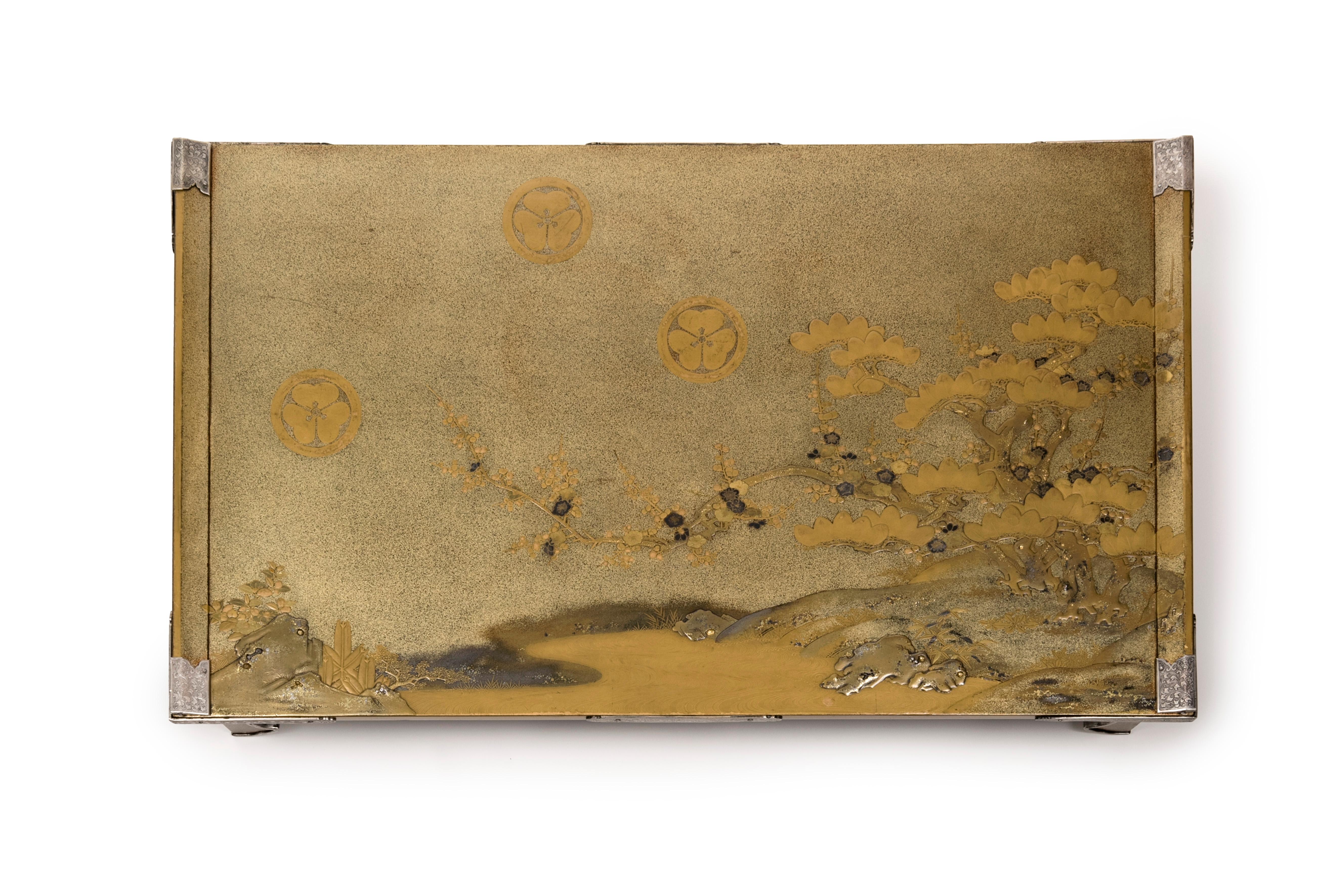 Lacquered Japanese Bundai or writting table in gold lacquer with a decor of lake landscape For Sale