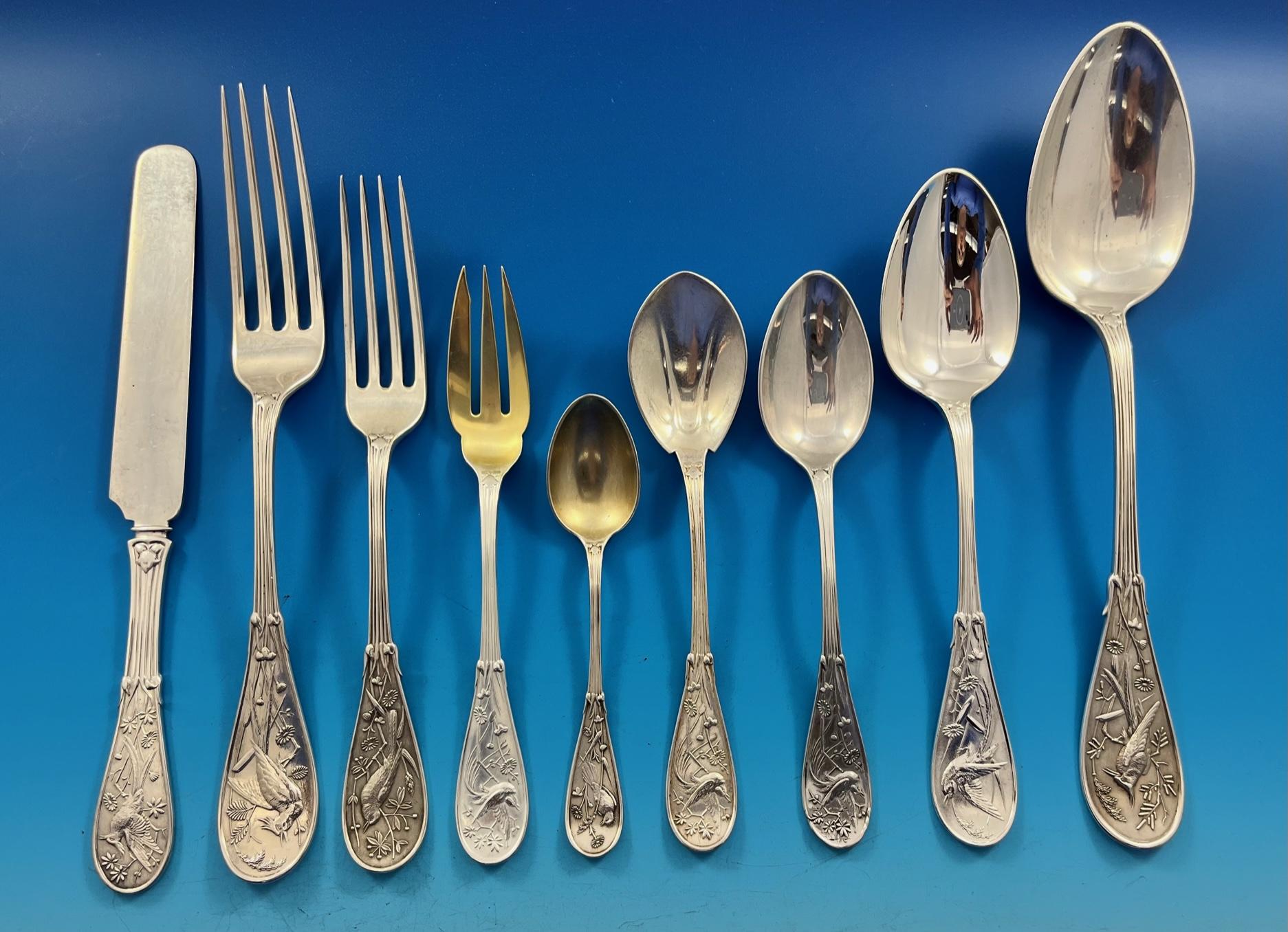 Exceptional antique late-19th century multi-motif Japanese by Tiffany & Co. sterling silver dinner flatware set, 102 pieces. This set includes: 

12 knives, flat handle all-sterling, 8