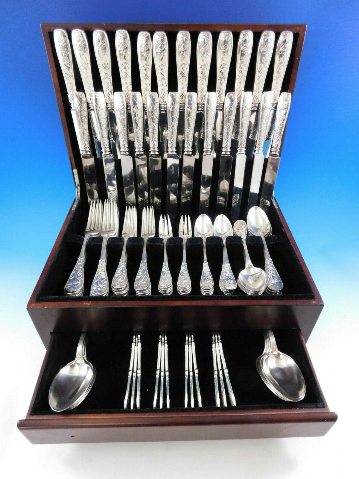 Exceptional antique late 19th century multi-motif Japanese by Tiffany & Co. sterling silver dinner flatware set, 108 pieces. This set includes:

12 dinner size knives, blunt, 10 1/4