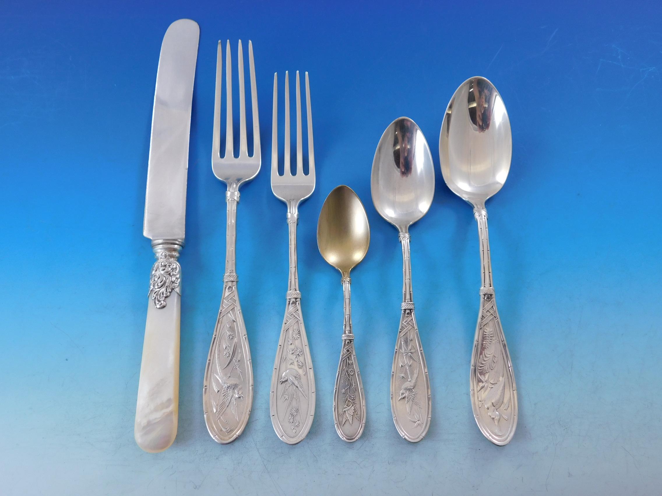 Rare Japanese by Whiting, circa 1874, sterling silver flatware set - 55 pieces (including 8 mother of pearl handle knives). This Japonesque pattern features a multi-motif design depicting realistic birds among a background of grasses, with a bamboo