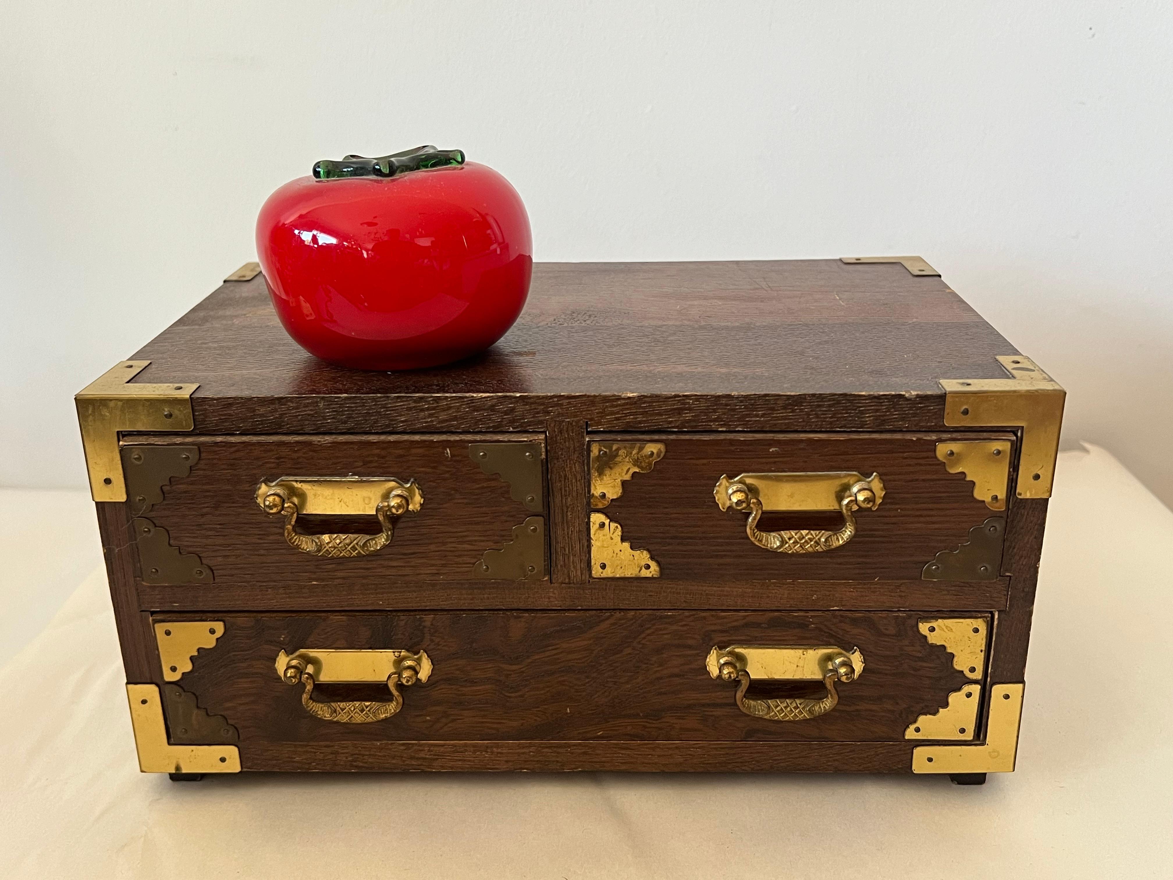 A lovely Japanese, vintage ca' 1960's miniature chest. Drawers lined in felt, brass hardware, campaign style exposed brackets.