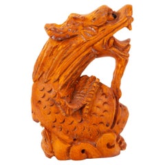 Netsuke Inro Ojime japonais en bois de buis sculpté en forme de dragon
