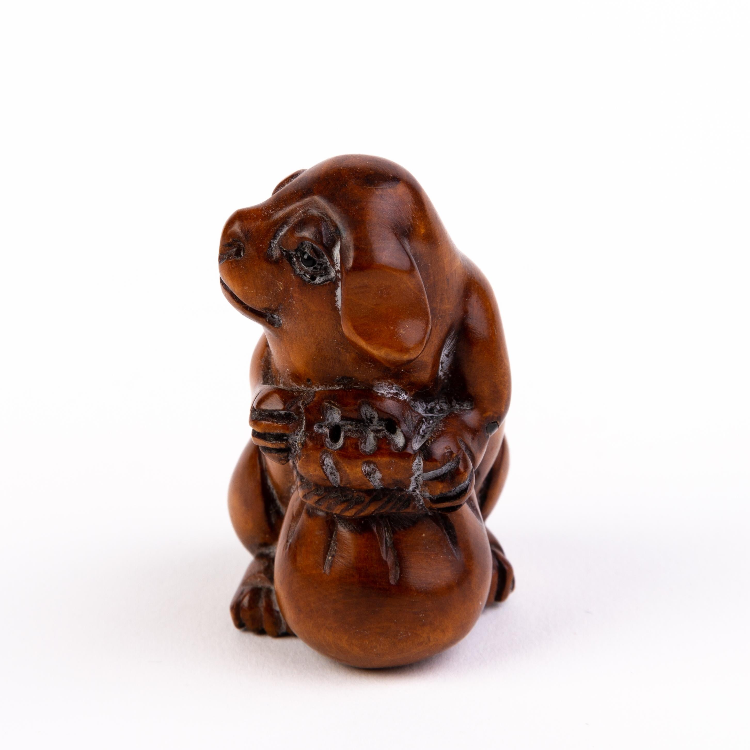 20th Century Japanese Carved Boxwood Netsuke Inro of a Puppy For Sale