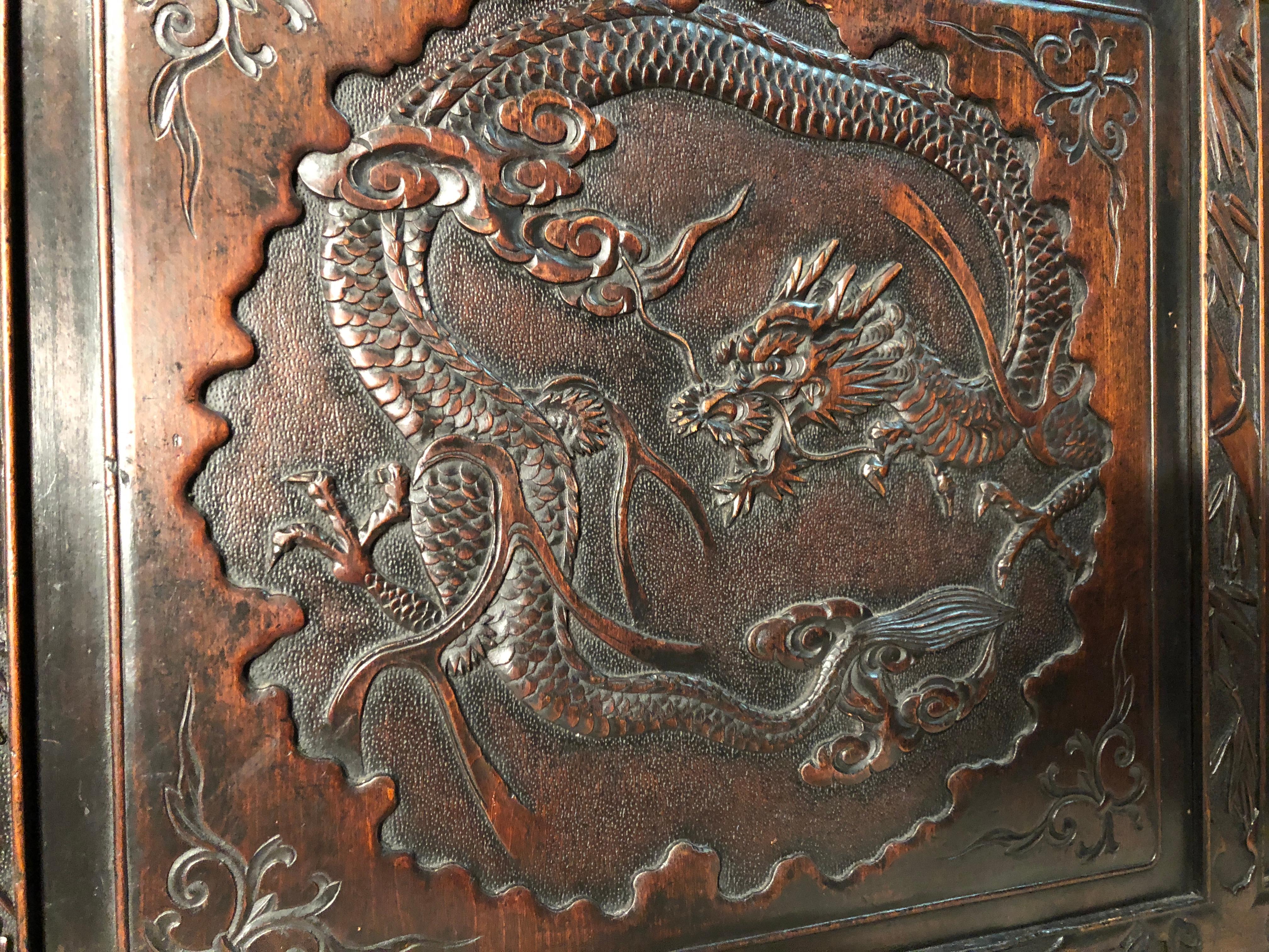 Japanese Dragon bench, hardwood exquisitely carved. In very good, vintage condition. The bench will be shipped from Germany. Shipping costs to Boston are included.