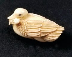Japanese Carved Netsuke A Goose Biting a Fish-Signed by Tomotada, Edo