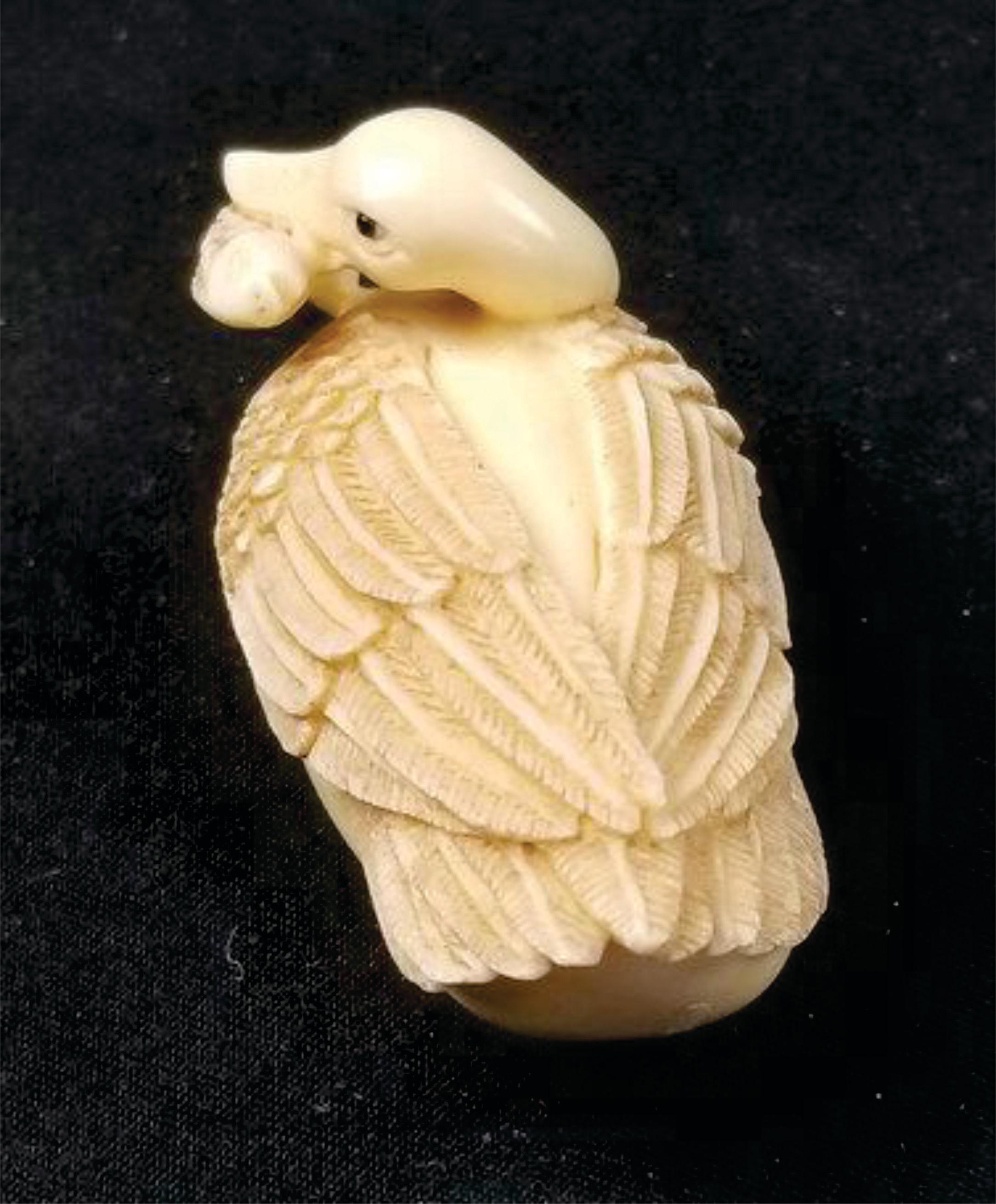 Hand-Crafted Japanese Carved Netsuke A Goose Biting a Fish-Signed by Tomotada, Edo For Sale