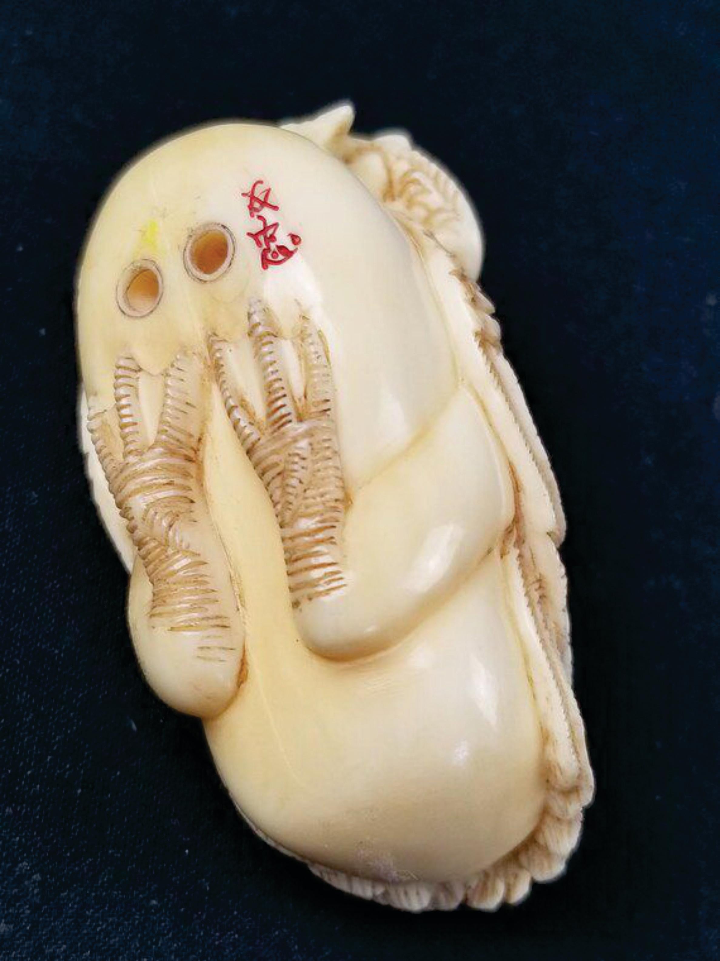 Ivory Japanese Carved Netsuke A Goose Biting a Fish-Signed by Tomotada, Meiji  For Sale