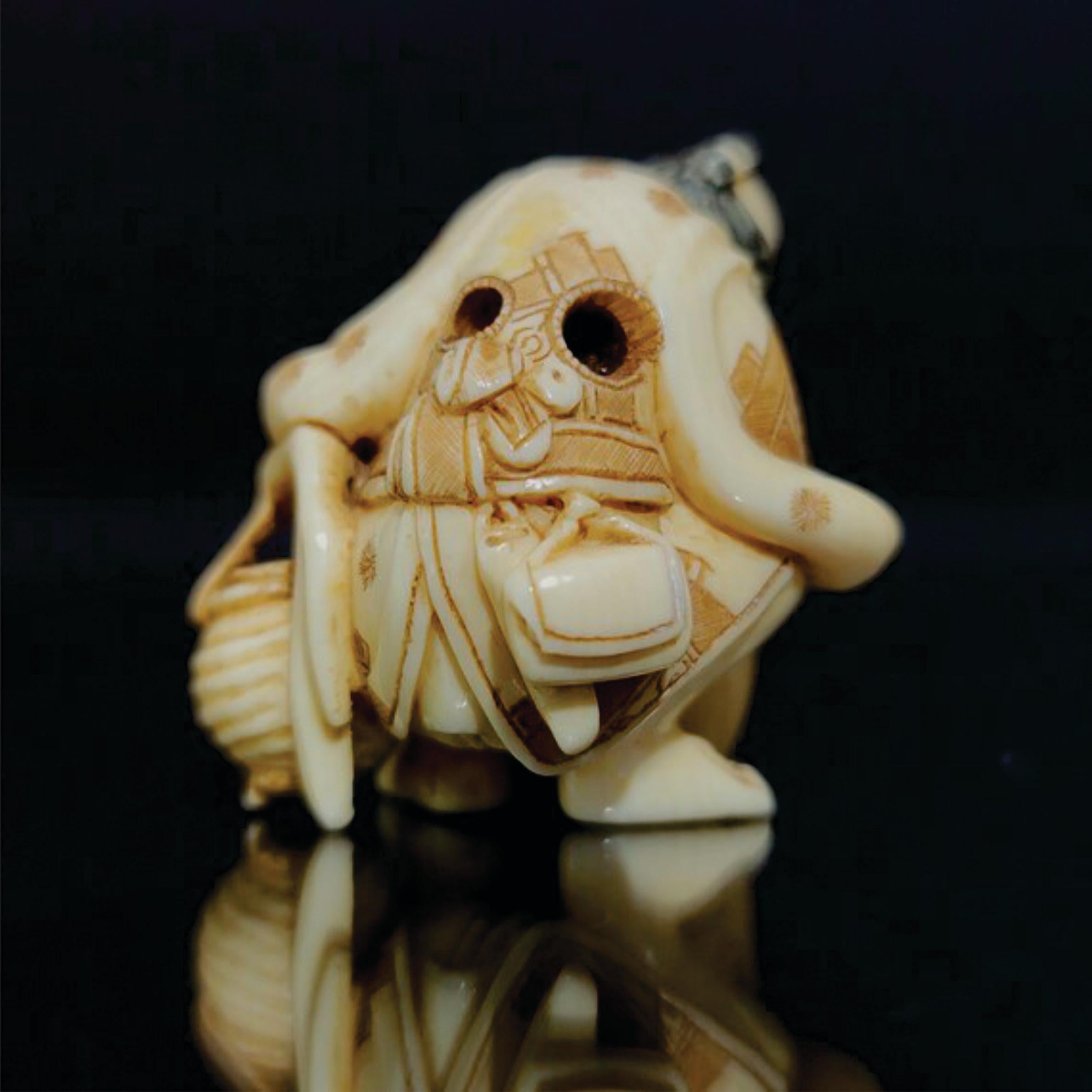 Japanese Carved Netsuke Polychrome Decorated Figure, Signed by Yoshitomo, Meiji  In Excellent Condition For Sale In Norton, MA