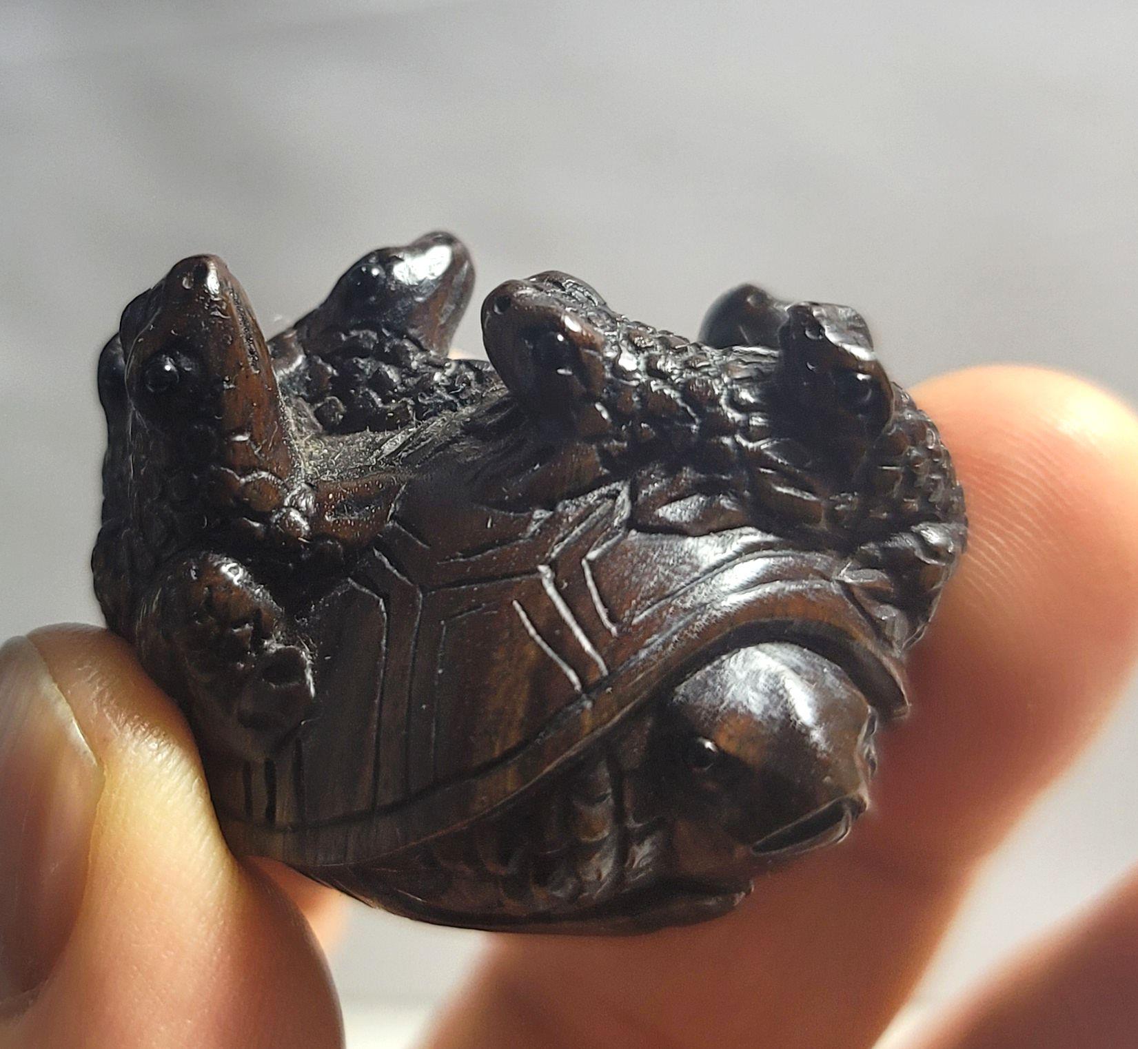 Presenting a fine treasure of a Japanese Carved Wood Netsuke 