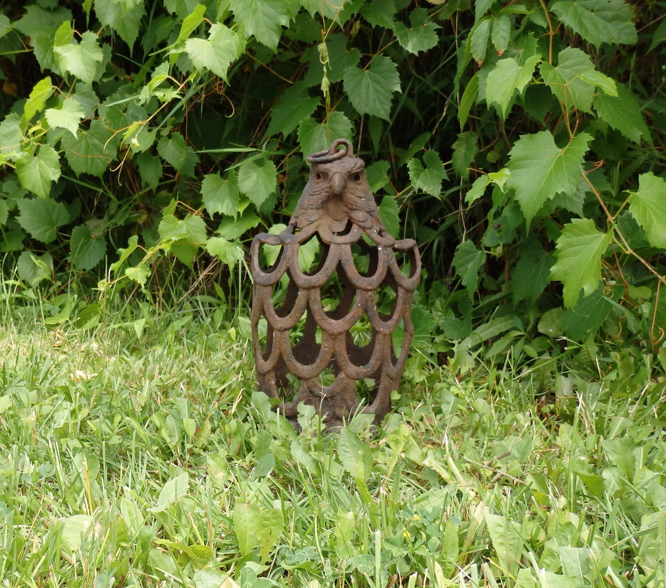 Japanese cast iron eagle tea house garden lantern. Early 20th century with natural rust patina.