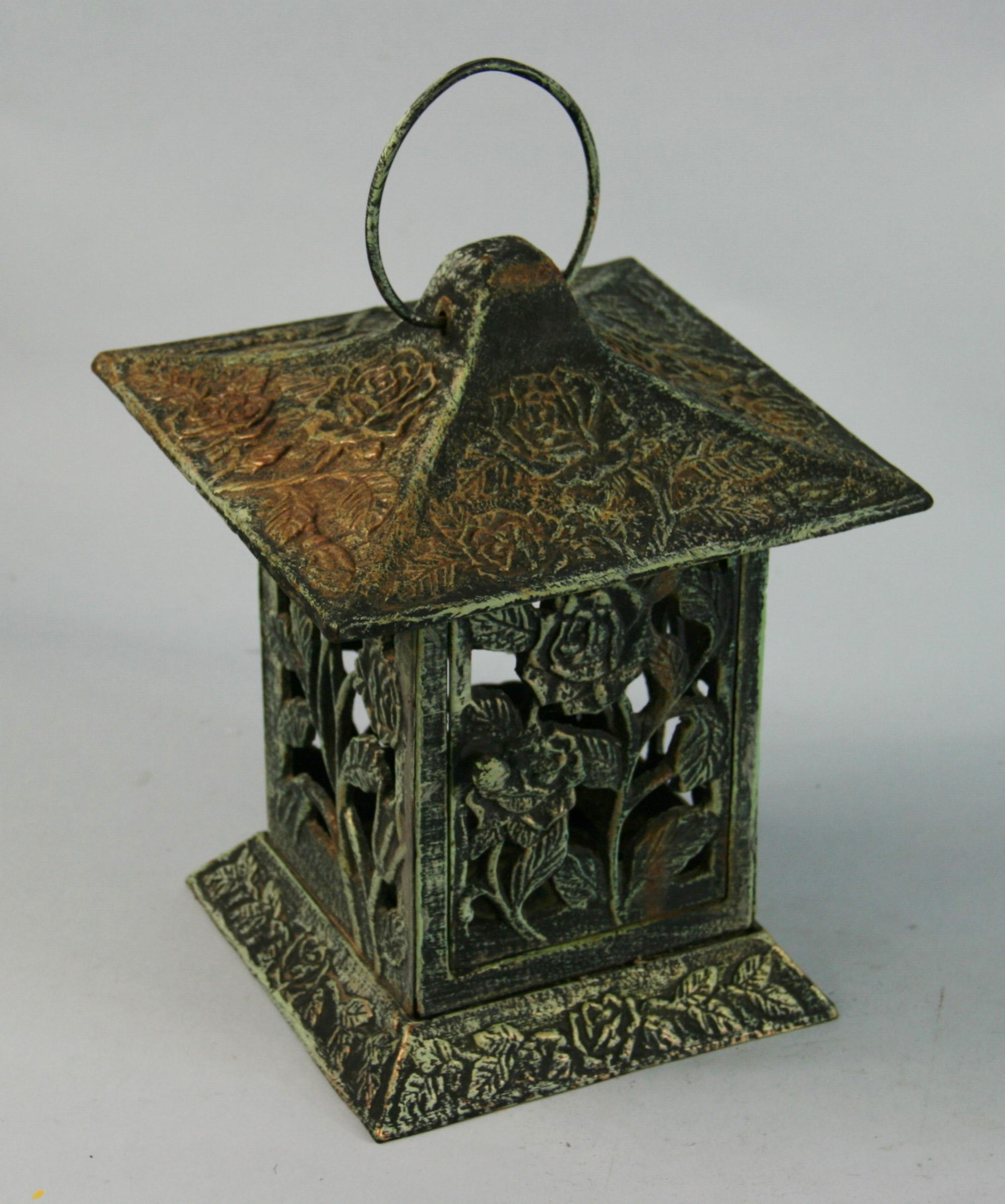 Japanese cast iron candle lantern with roses and leaves
Height without loop 10.5
Height with loop 13