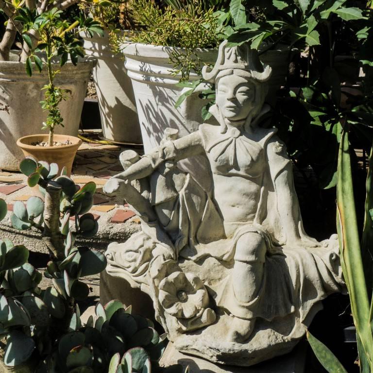 The warrior himself is 29 inches in height and with the base stands at 50 inches. It is available with or with out the base and blends well with floral surroundings.

 
