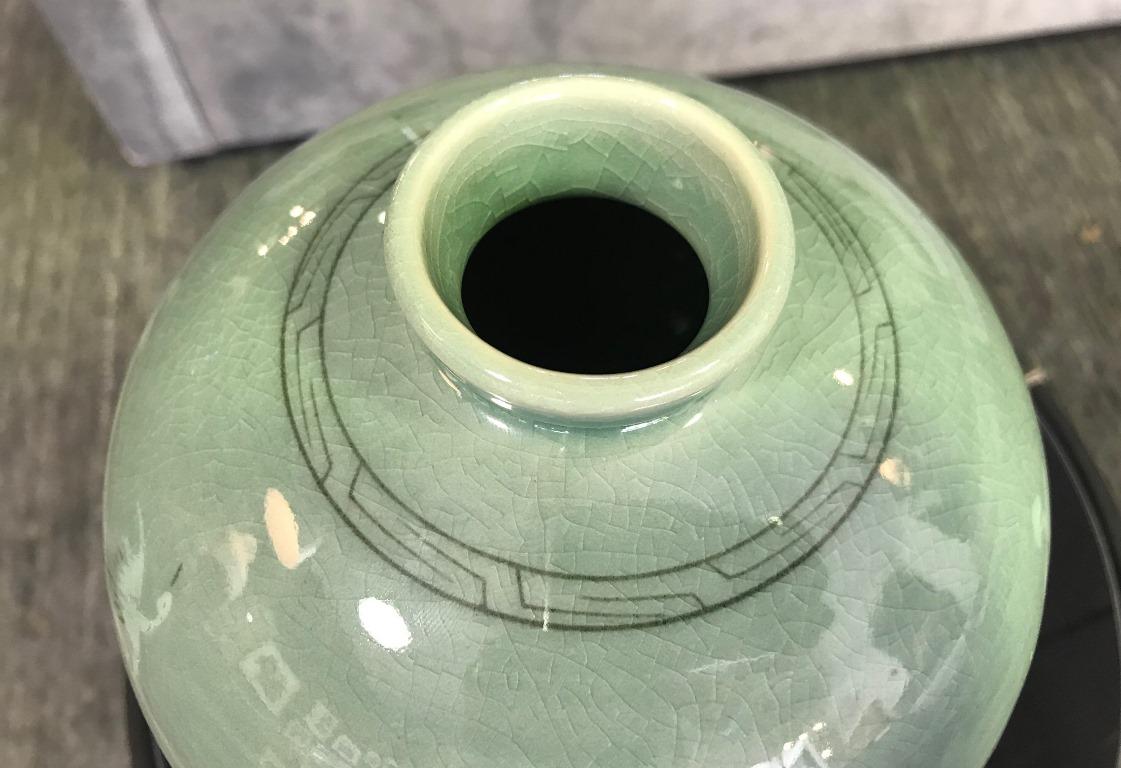 korean celadon vase with cranes