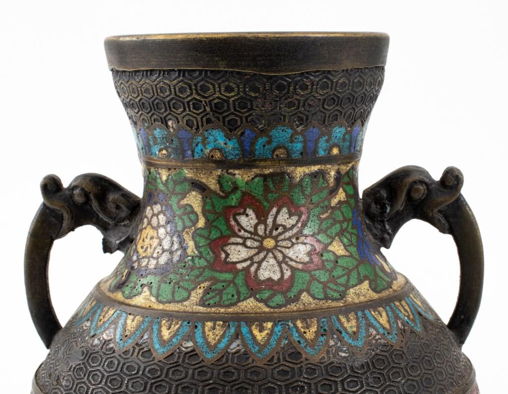 Japanese Champleve Vase with dragon head handles, late 19th century. Provenance: From 300 Central Park West estate. 

Dealer: S138XX