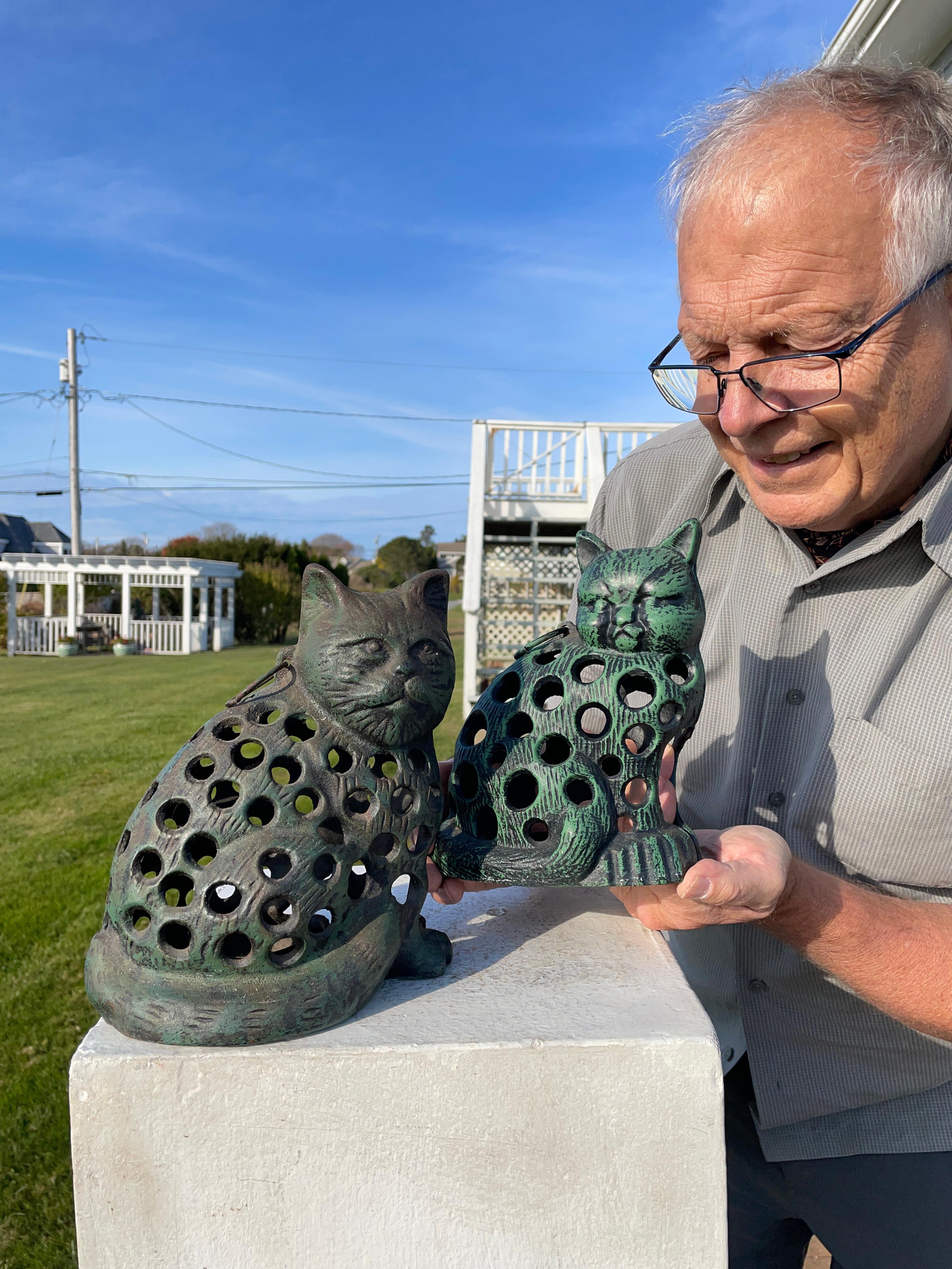 Unusual find- the first pair we've seen 

Japan, this handsome quality pair of old male and female cats motif iron garden lanterns is the first pair of their kind we have ever seen in this hard to find original paint. 

In a convenient portable