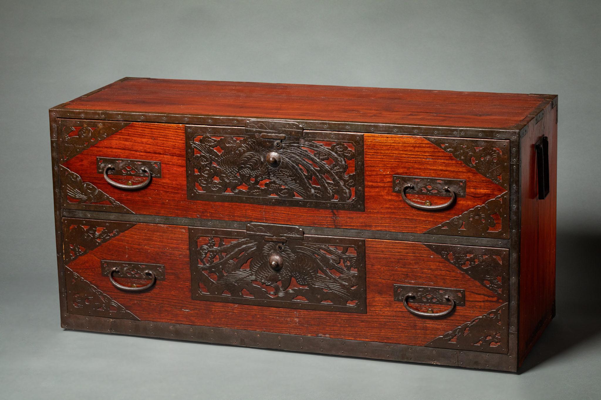 With two drawers. Top section of a two section chest. Elaborate hardware with cranes and clouds design. Hardware on all corners.