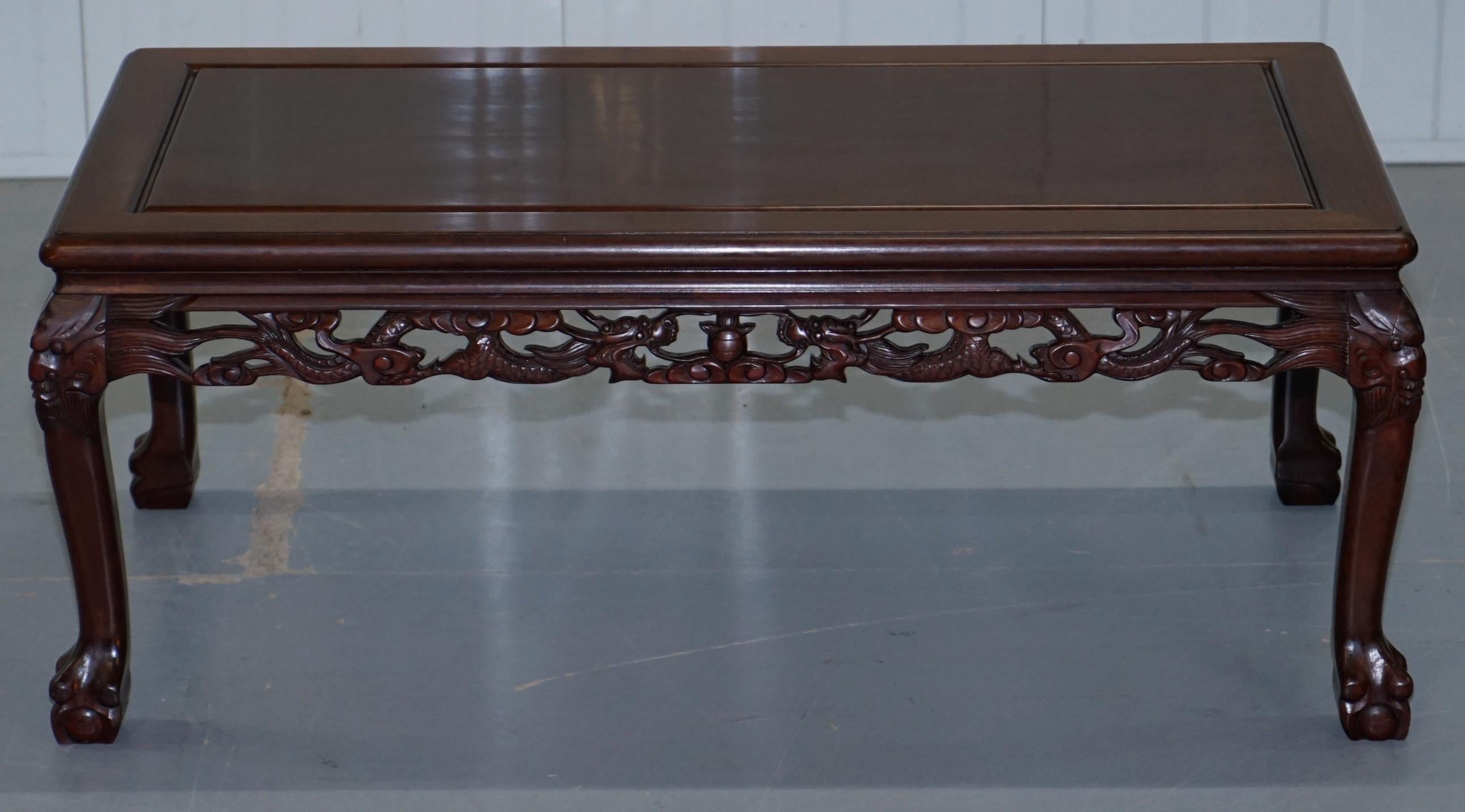We are delighted to offer for sale this lovely circa 1910 Japanese Chinese hand carved from solid wood tee or coffee table depicting Dragons and with claw and ball feet

A very ornate piece, the detail is mind-blowing, just look at the ornate