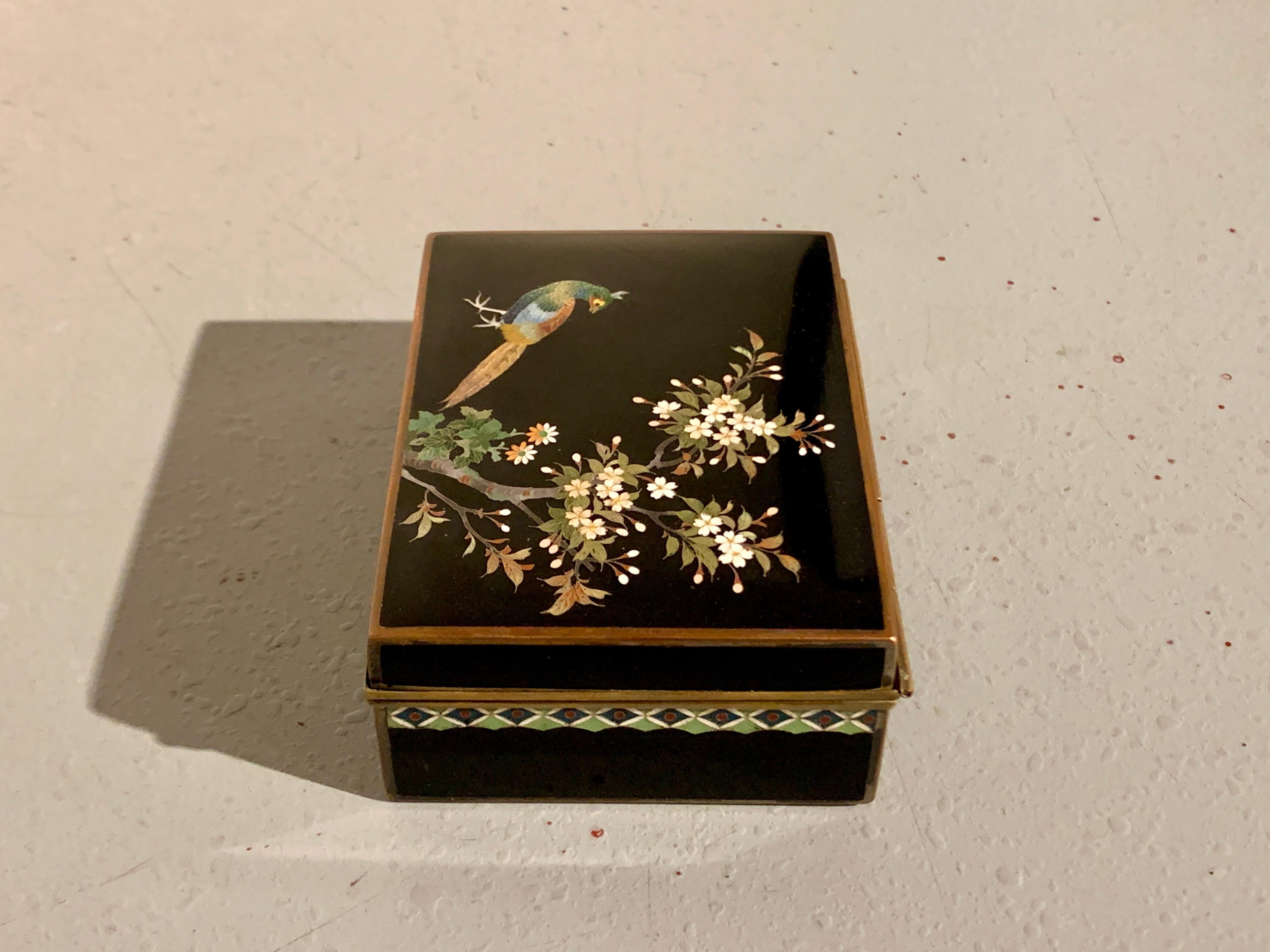 A fine Japanese cloisonne hinged box with pheasant and autumn foliage, by Inaba Nanaho and the Inaba Cloisonne Company, Meiji period, circa 1900, Japan.

The lovely jewelry or trinket box features a design to the lid of a beautiful long tailed