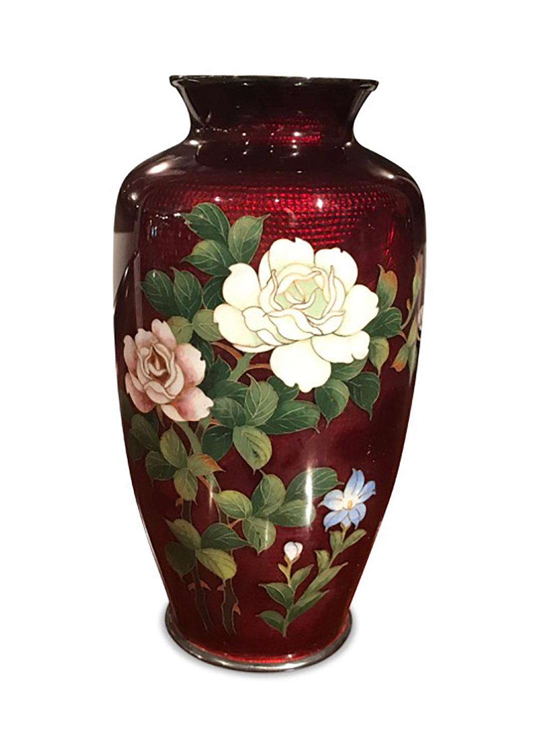 Japanese cloisonné akasuke (pigeon blood) style vase decorated with roses and ginbari foil basse-taile bamboo designs and patterning and silver trim.
 